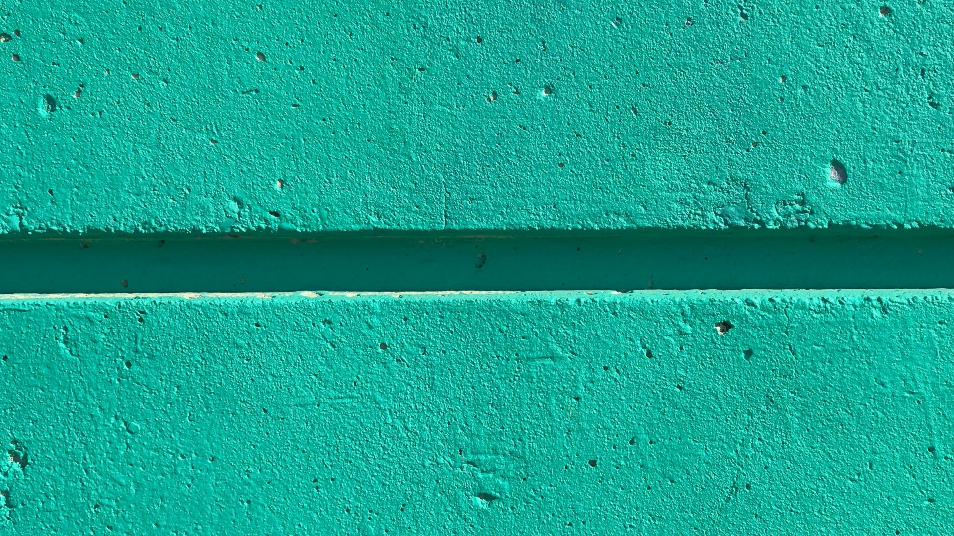 close view of teal color wall
