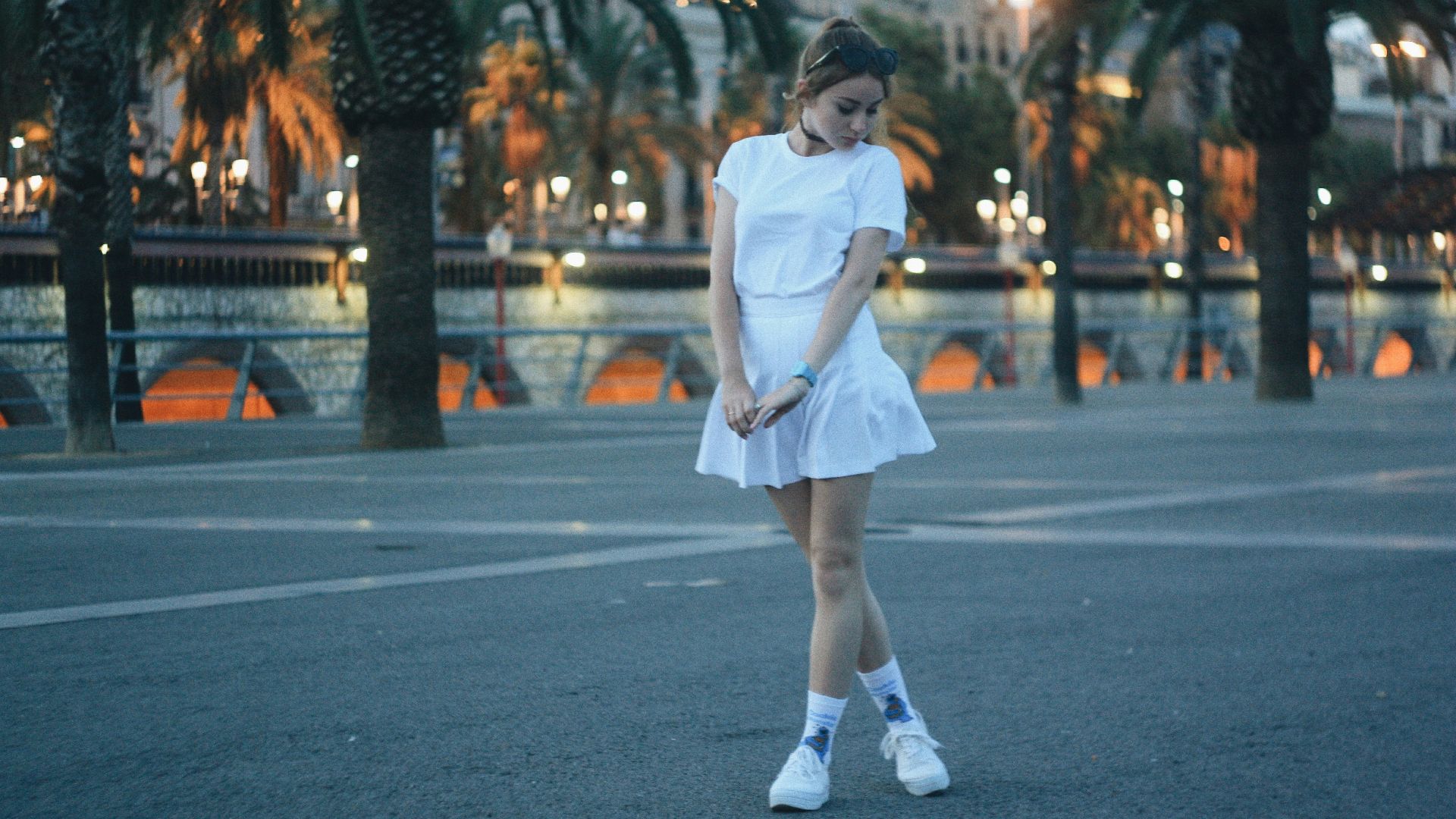 woman wearing whute shirt and white skirt