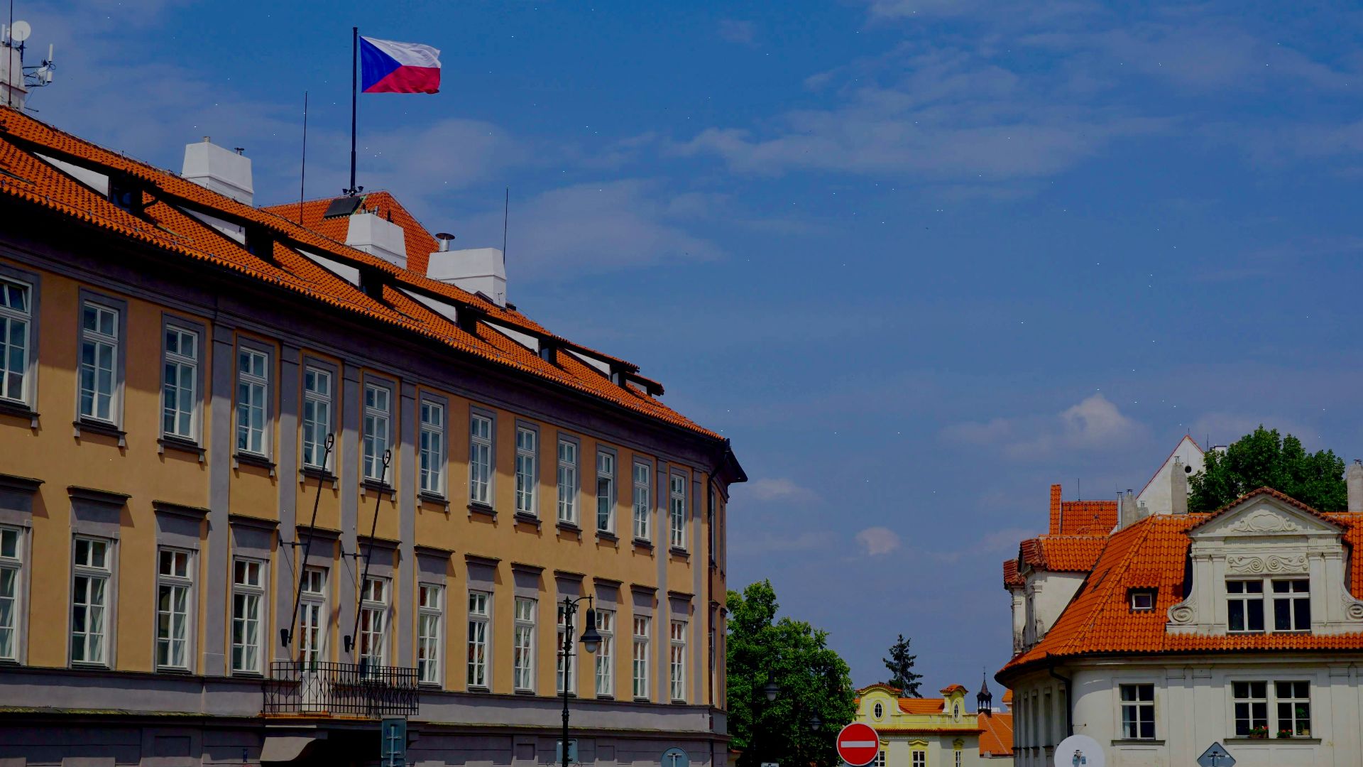 brown building under cloudy sky during daytime
