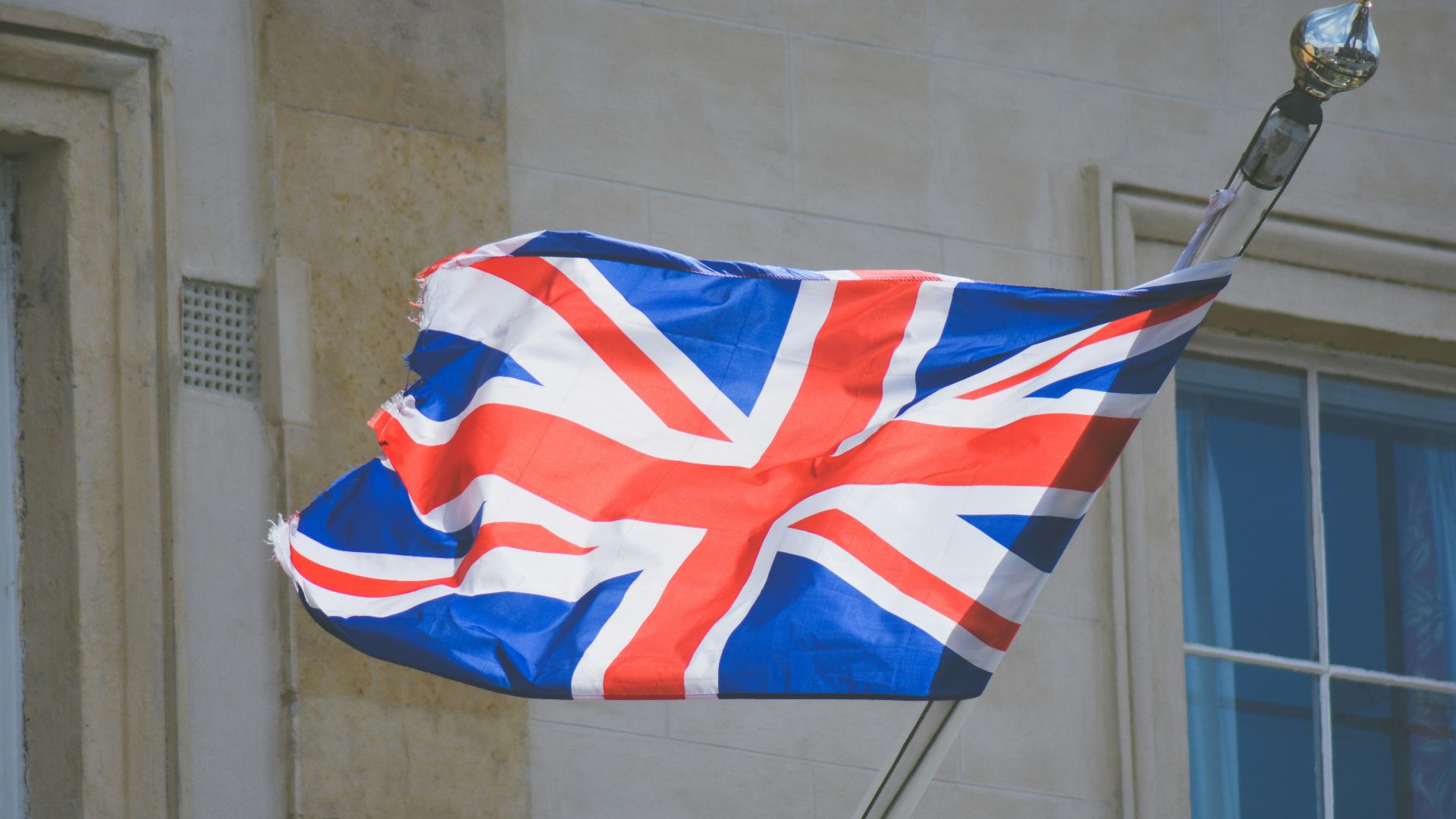 raised United Kingdom flag