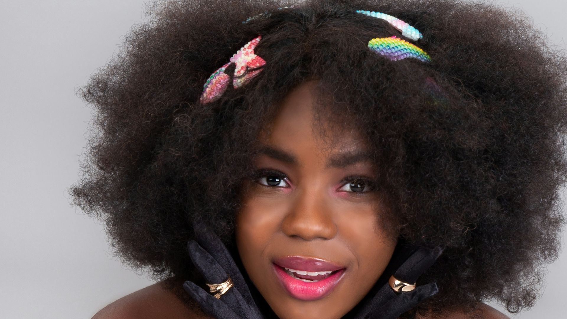 woman in black leather vest