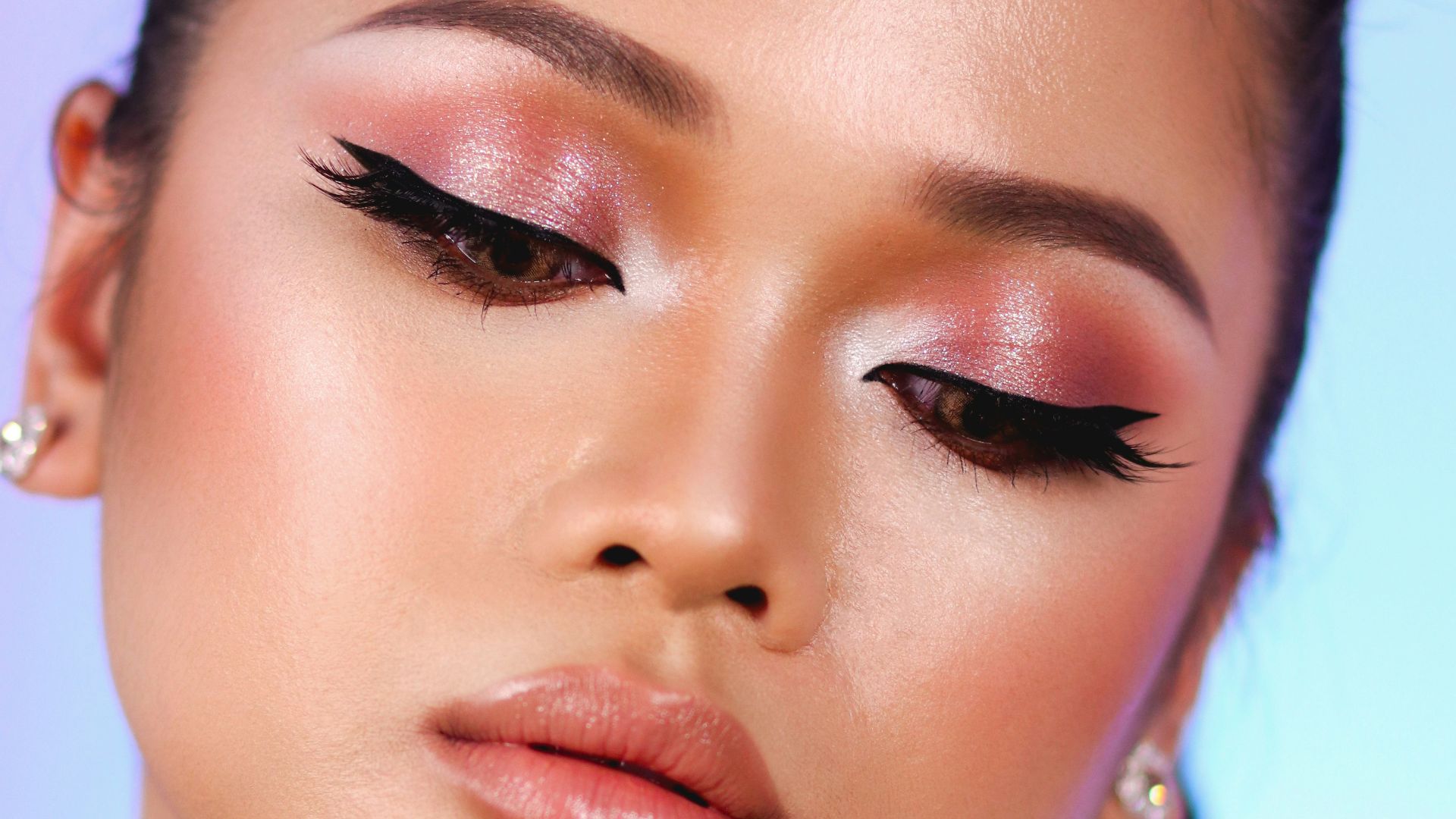 woman with pink lipstick and white shirt
