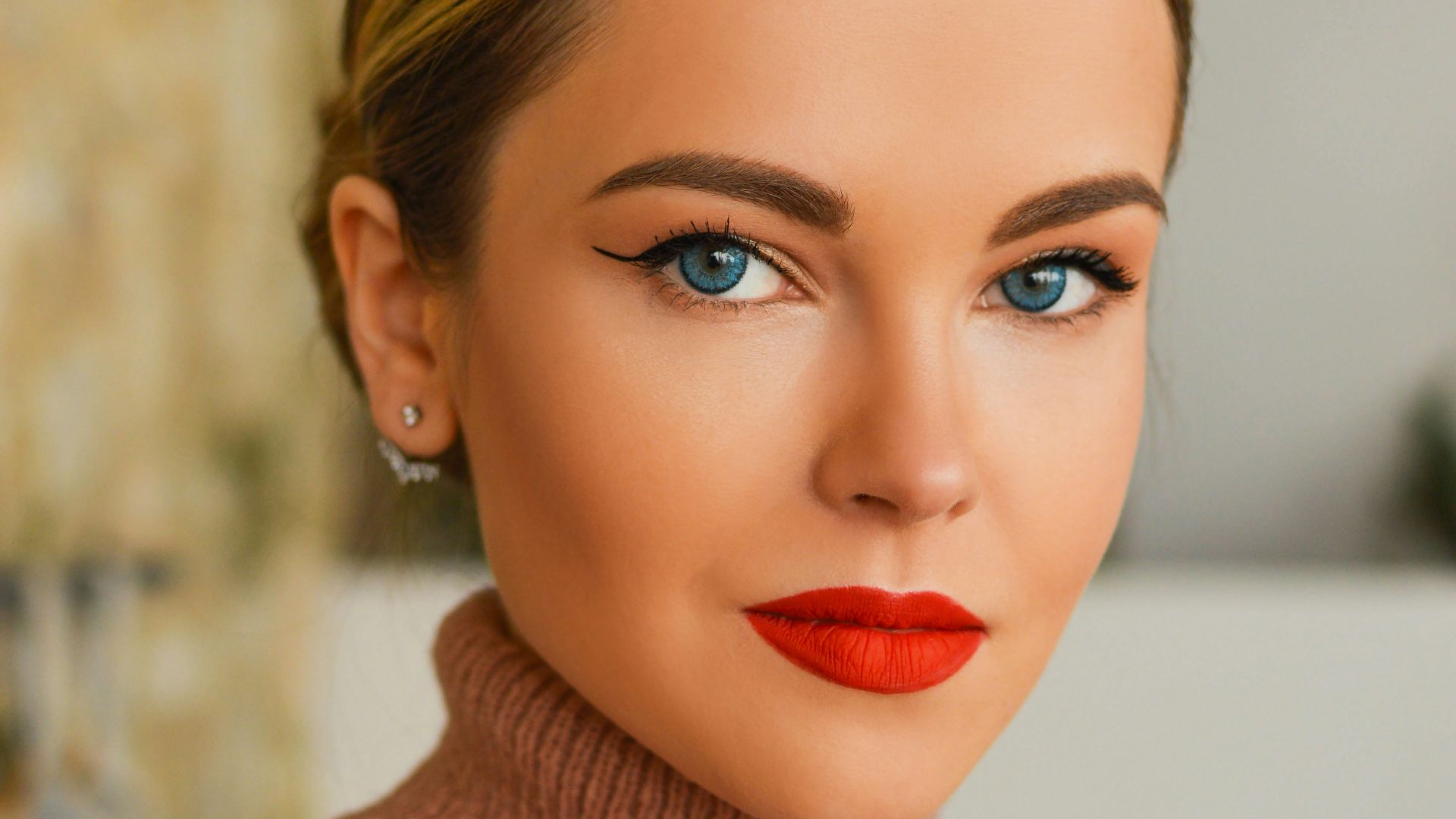 a person with red lipstick