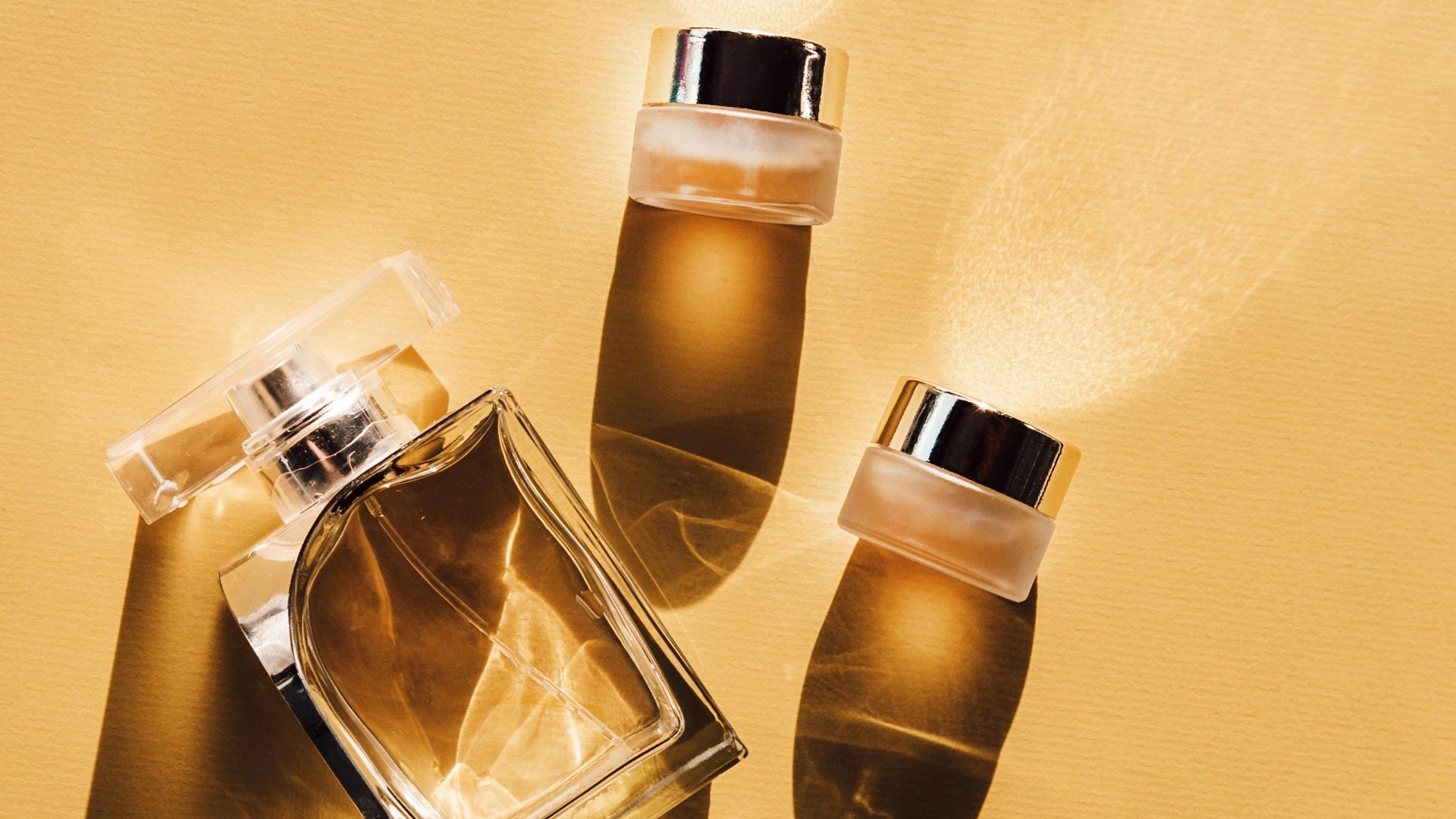 two clear glass perfume bottles