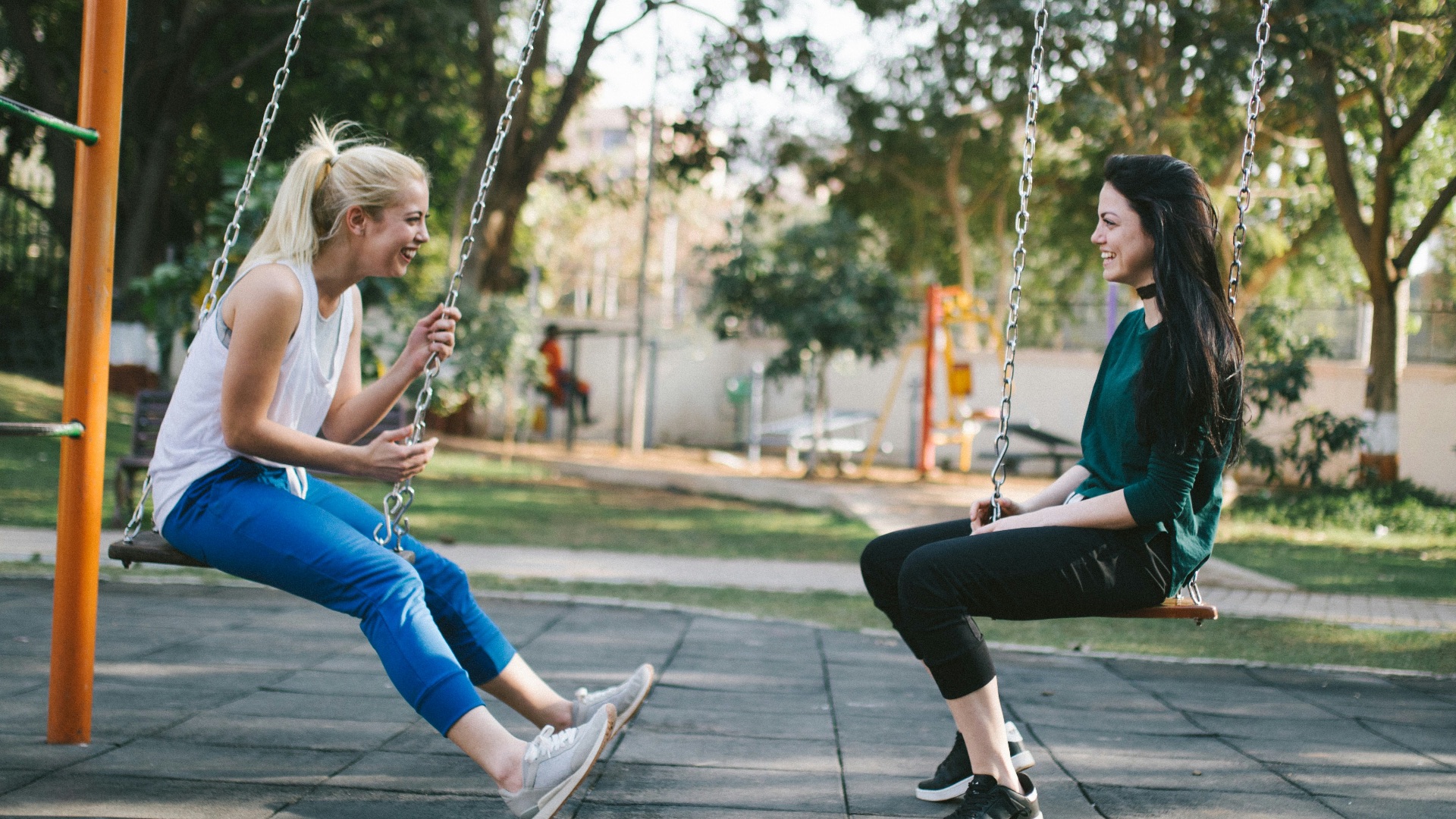 woman sitting on swing