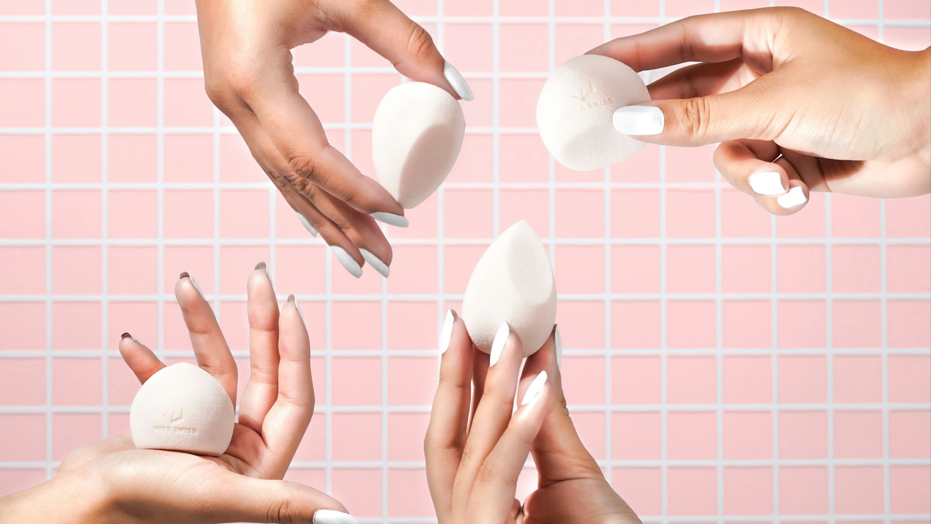 person holding white heart shaped ornament