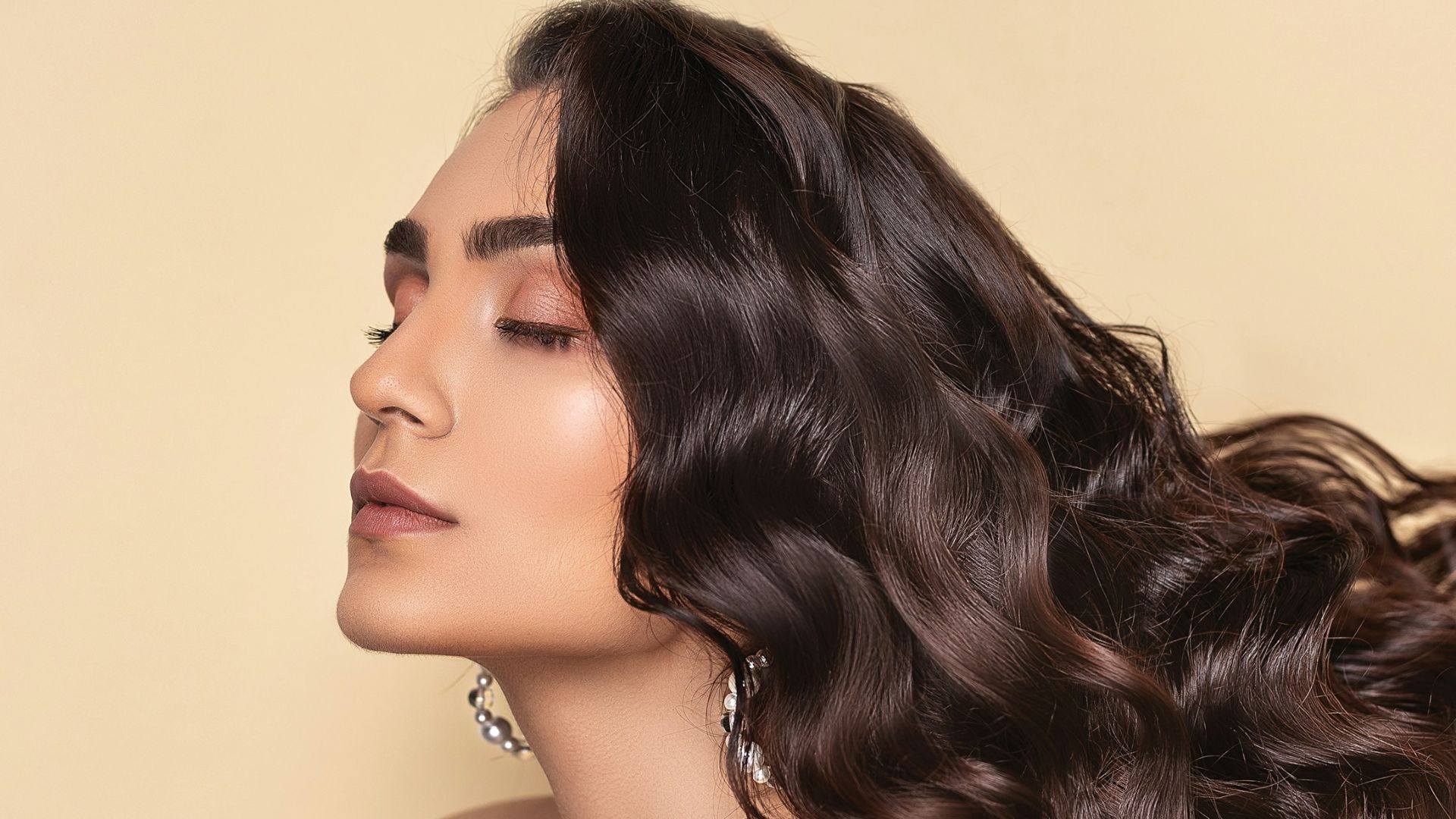 topless woman with eyes closed