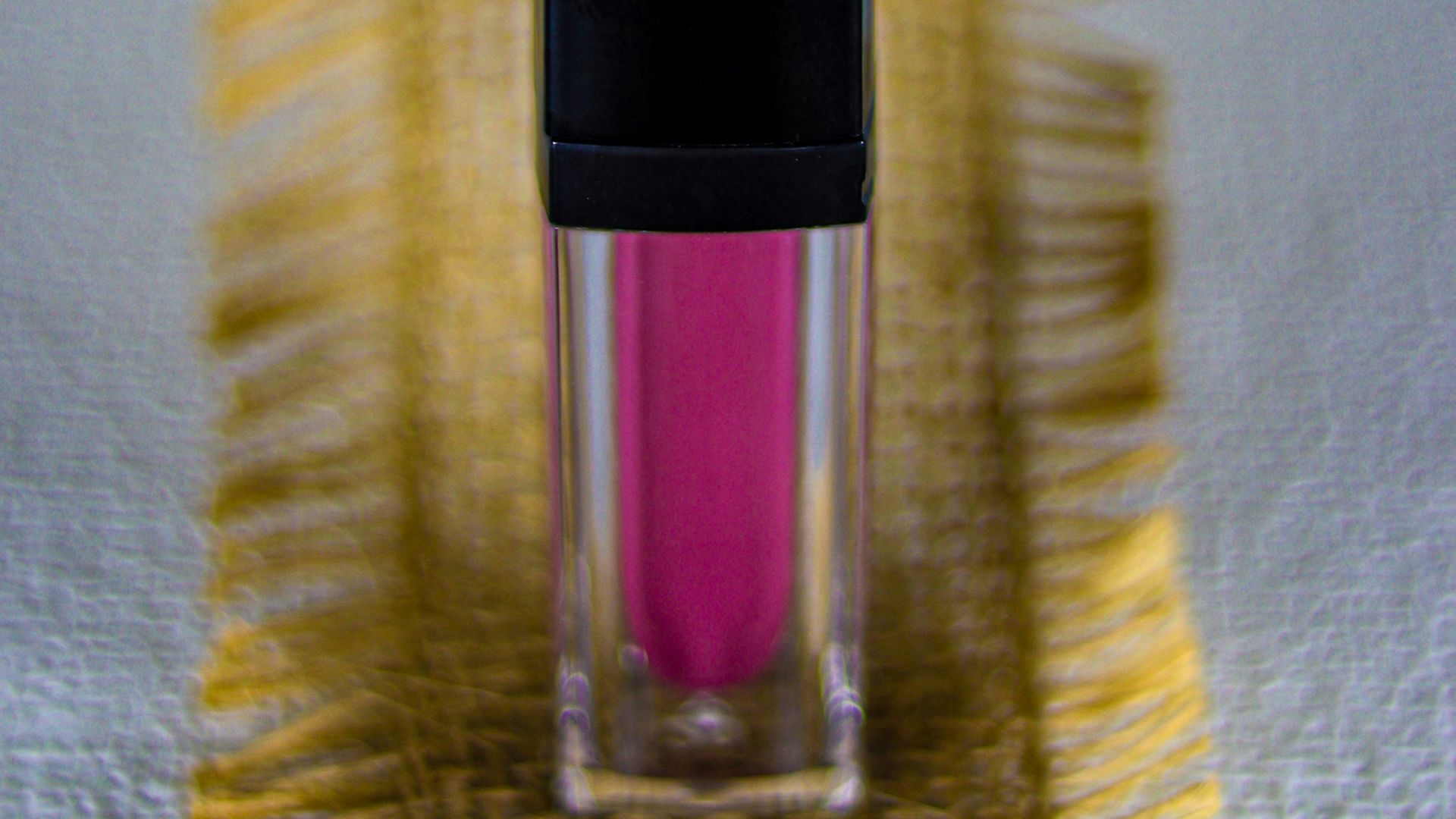 A bottle of liquid sitting on top of a table