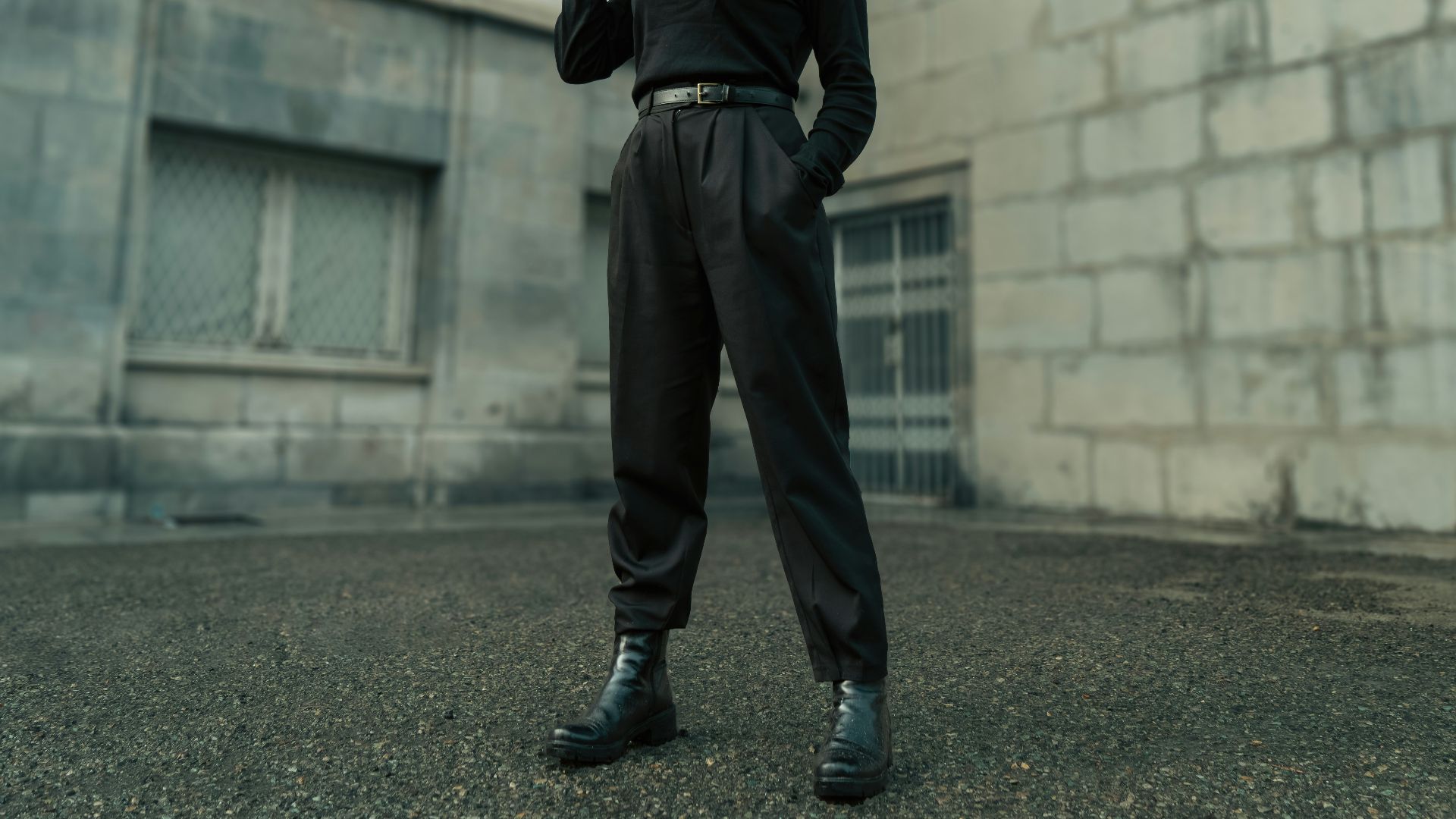 A woman standing in front of a building