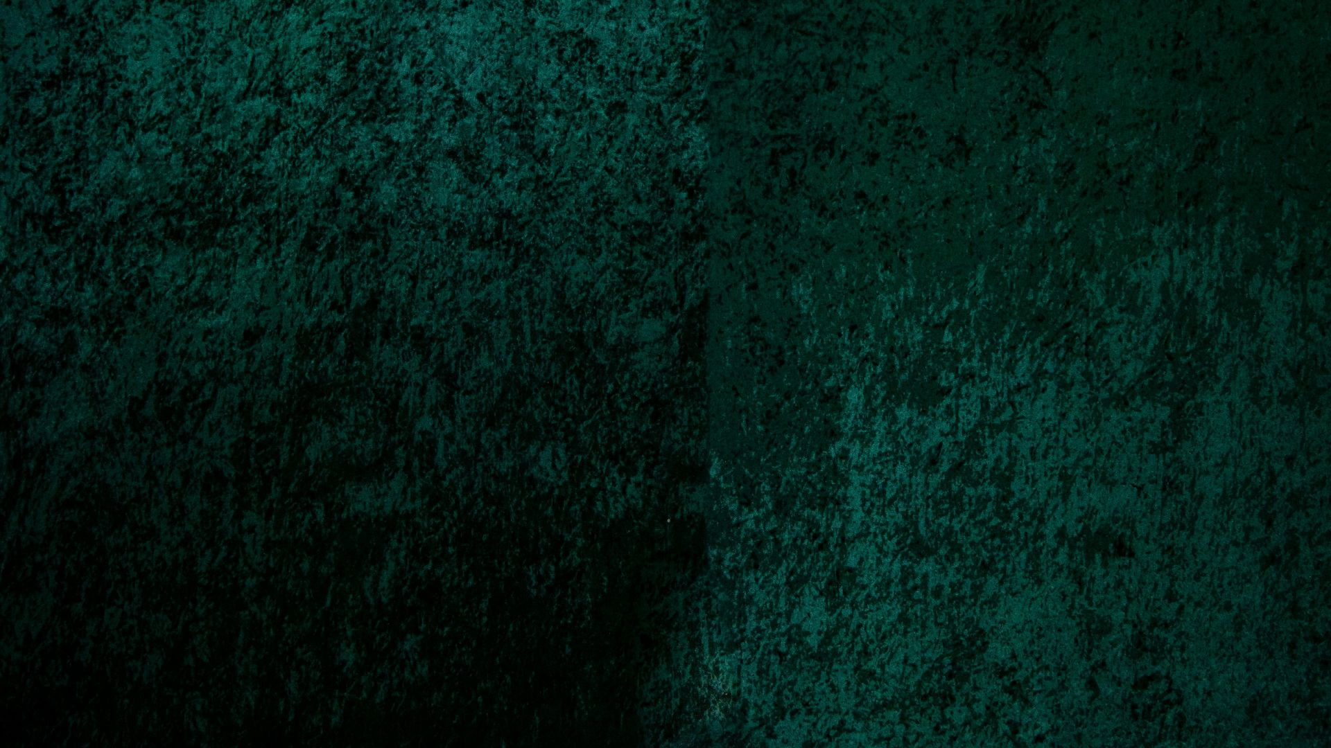 green textile in close up photography