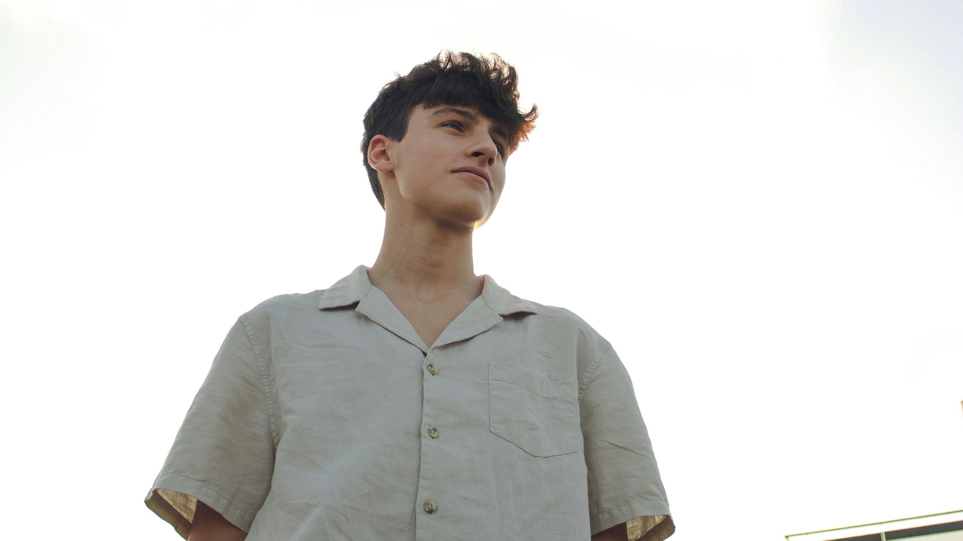 man in white button up shirt standing during daytime