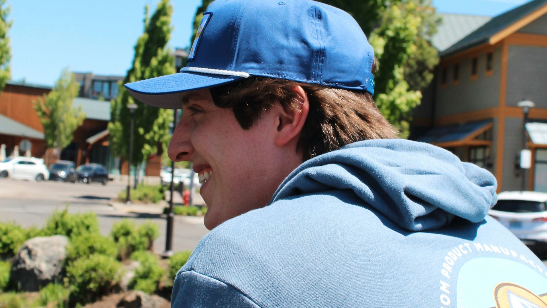 A man smiles while enjoying the view.