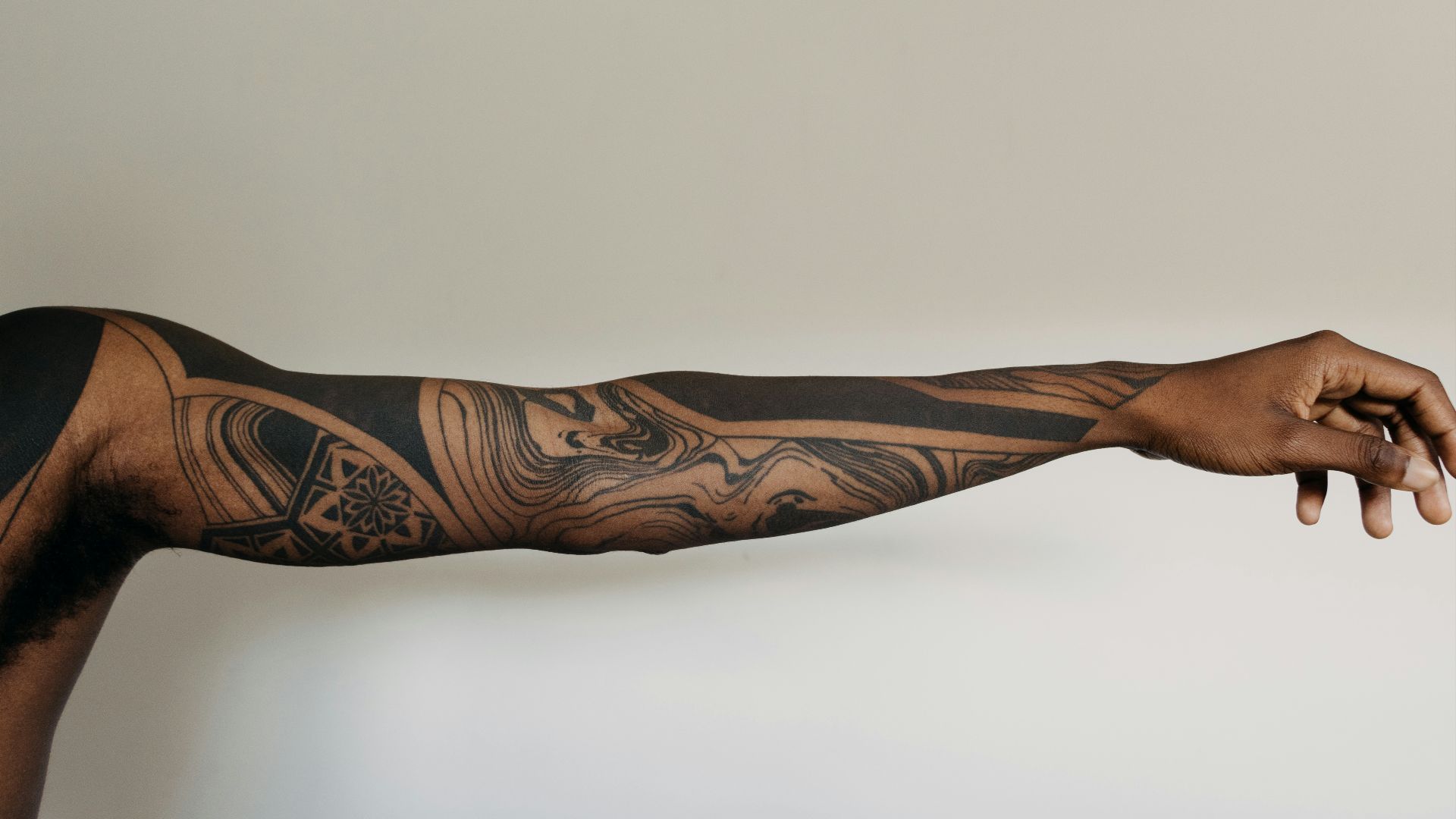 black and brown tribal tattoo