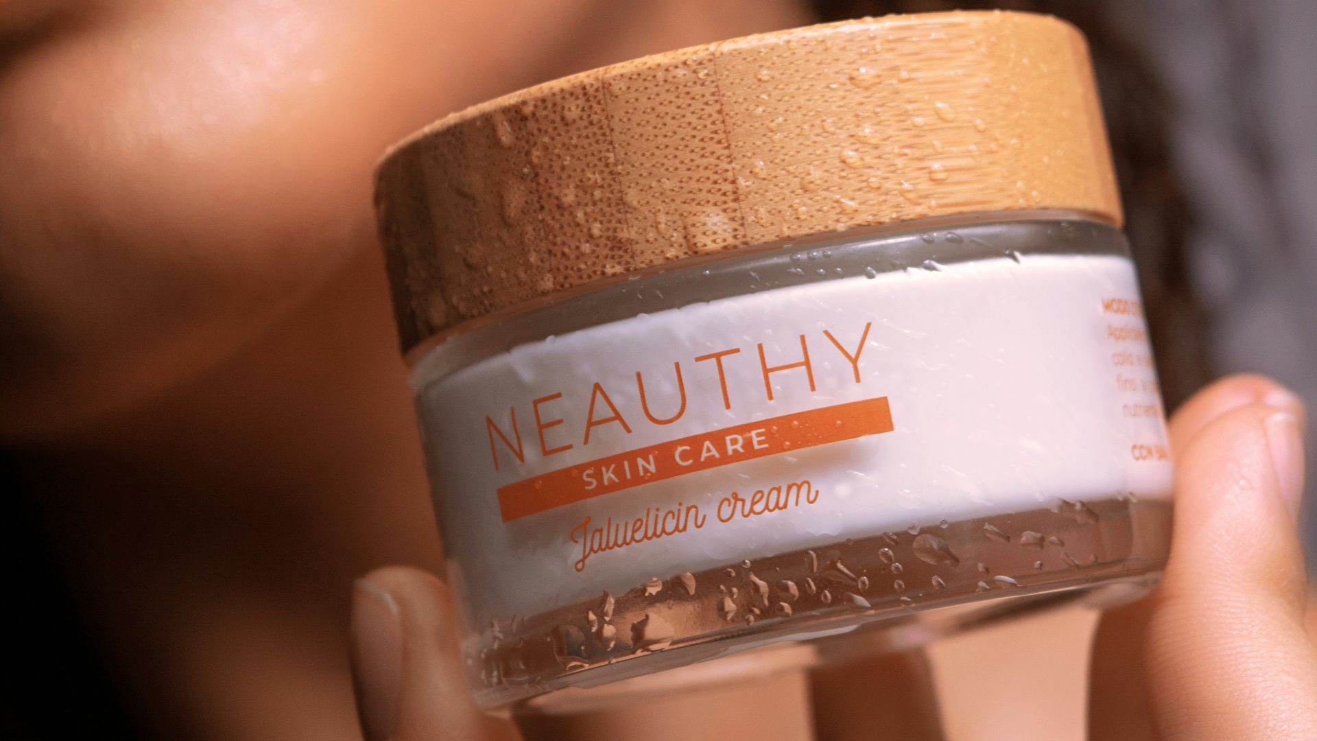 woman holding coconut oil bottle