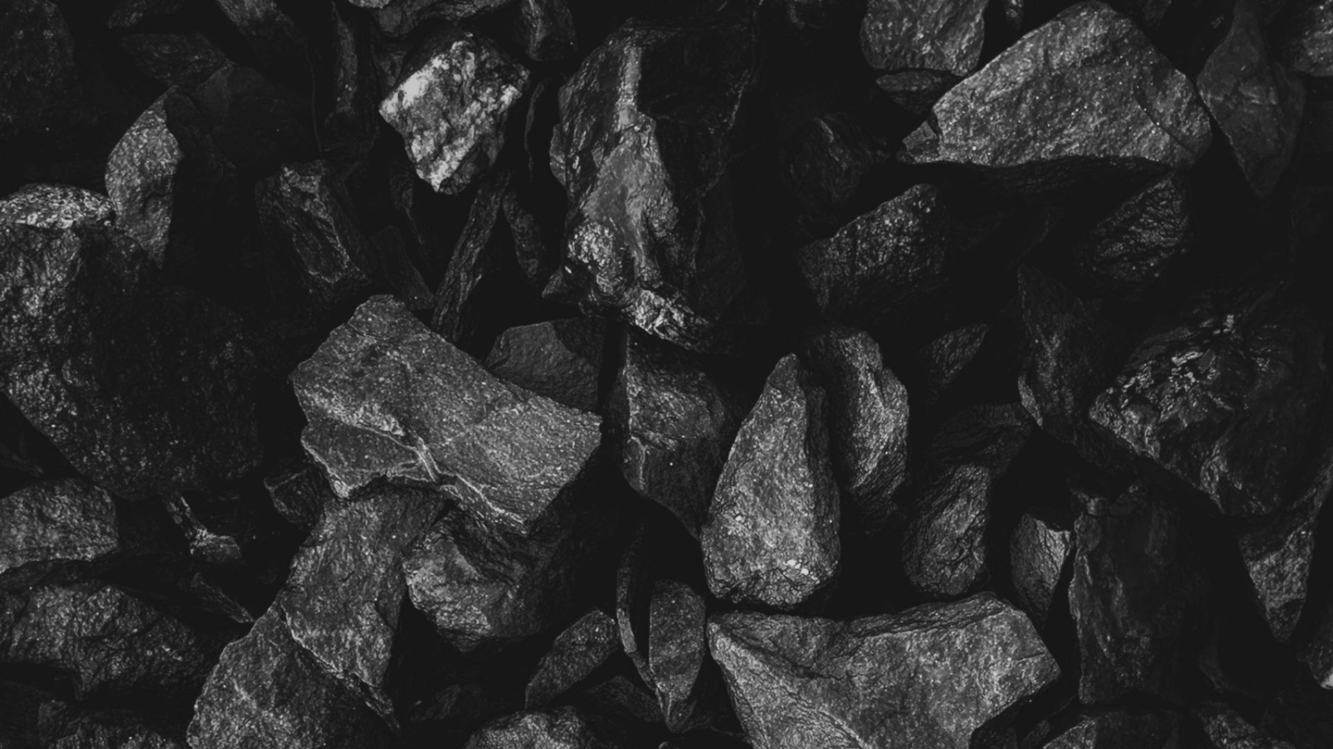 grayscale photo of stone