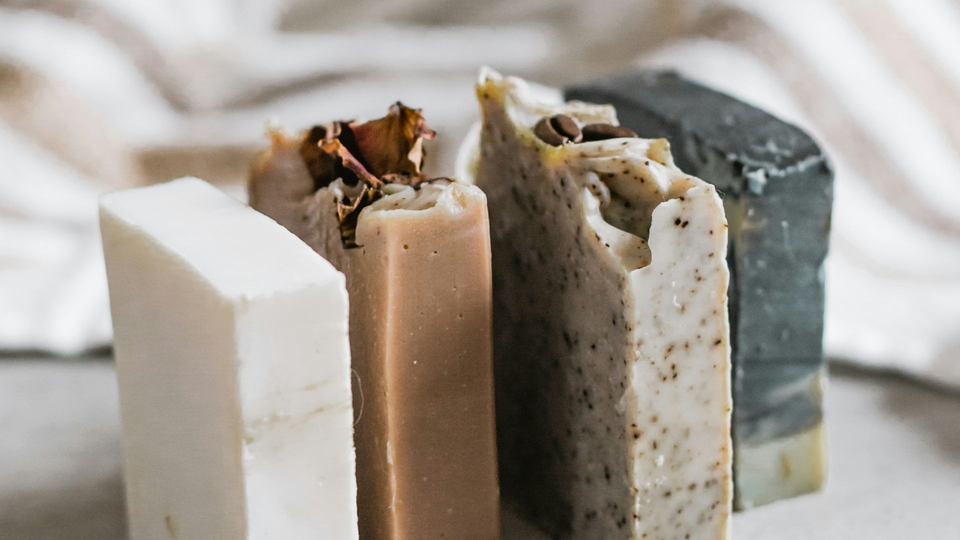 white and brown cake on white textile