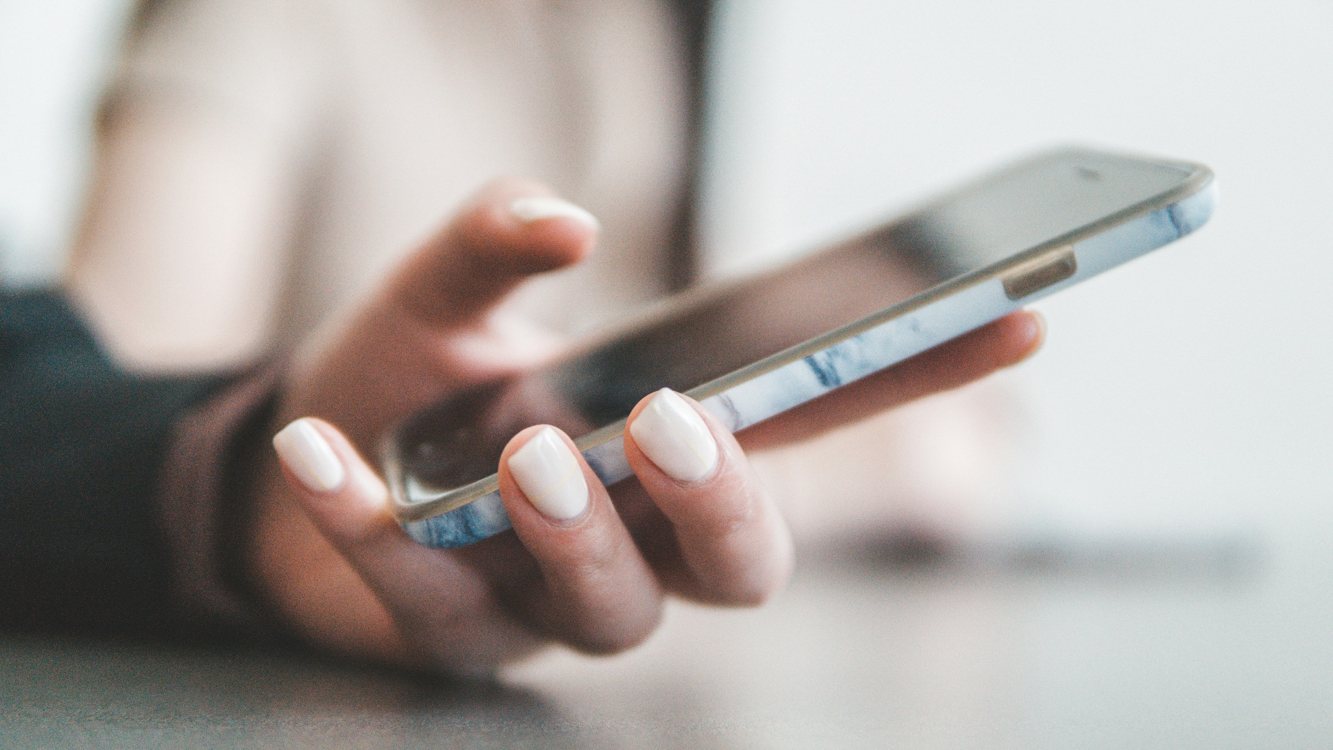 person holding black smartphone