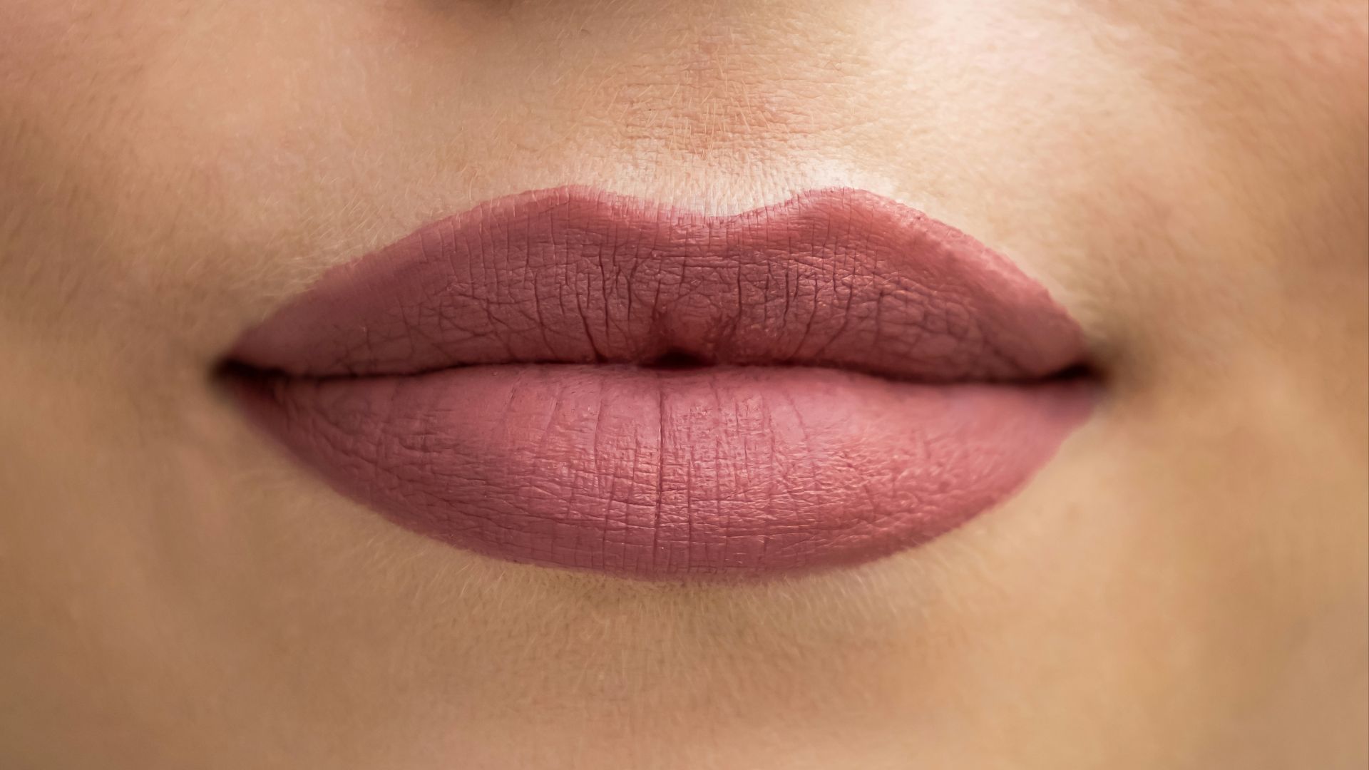 a close up of a woman's lips and nose