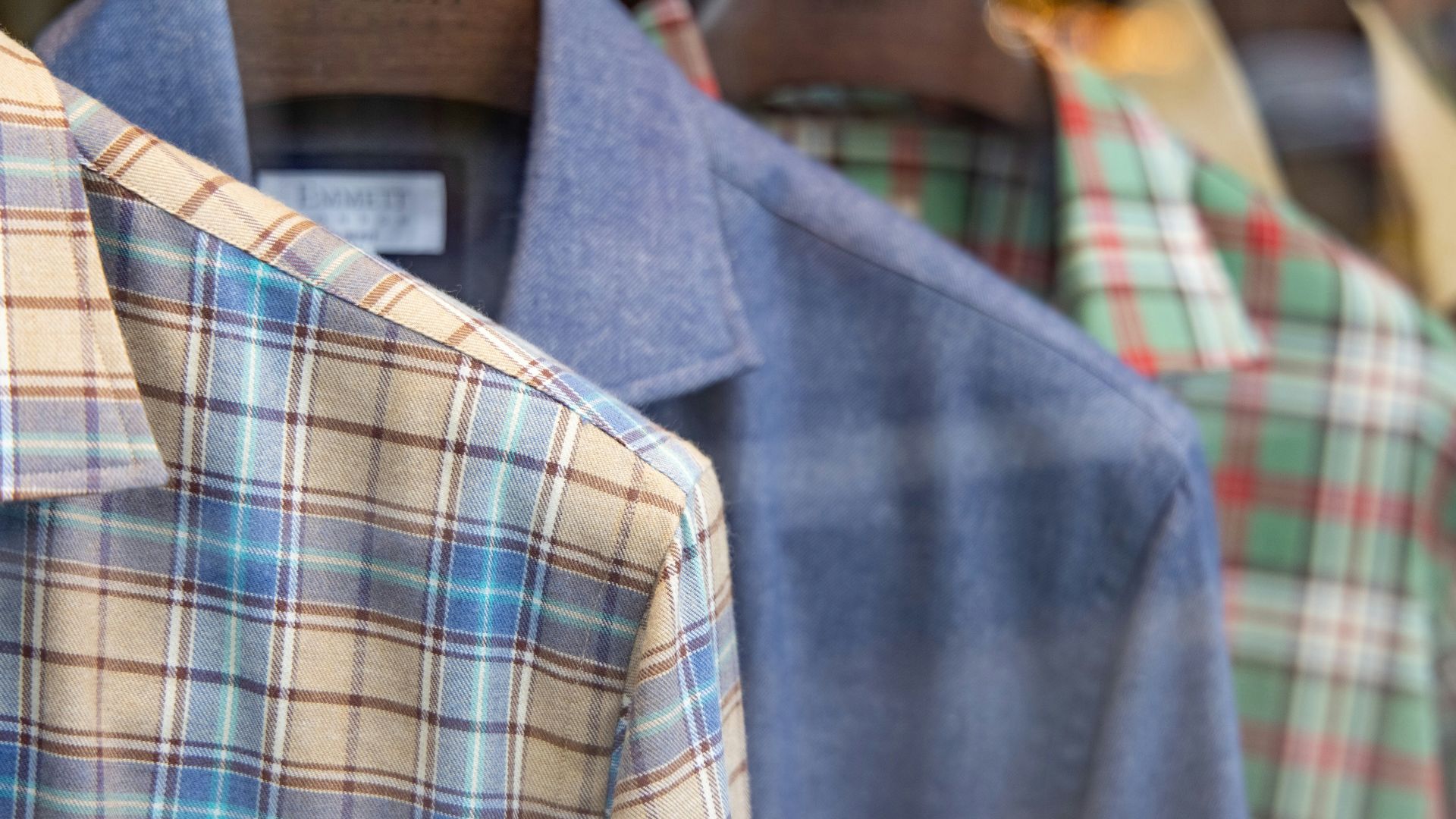 blue white and brown plaid button up shirt