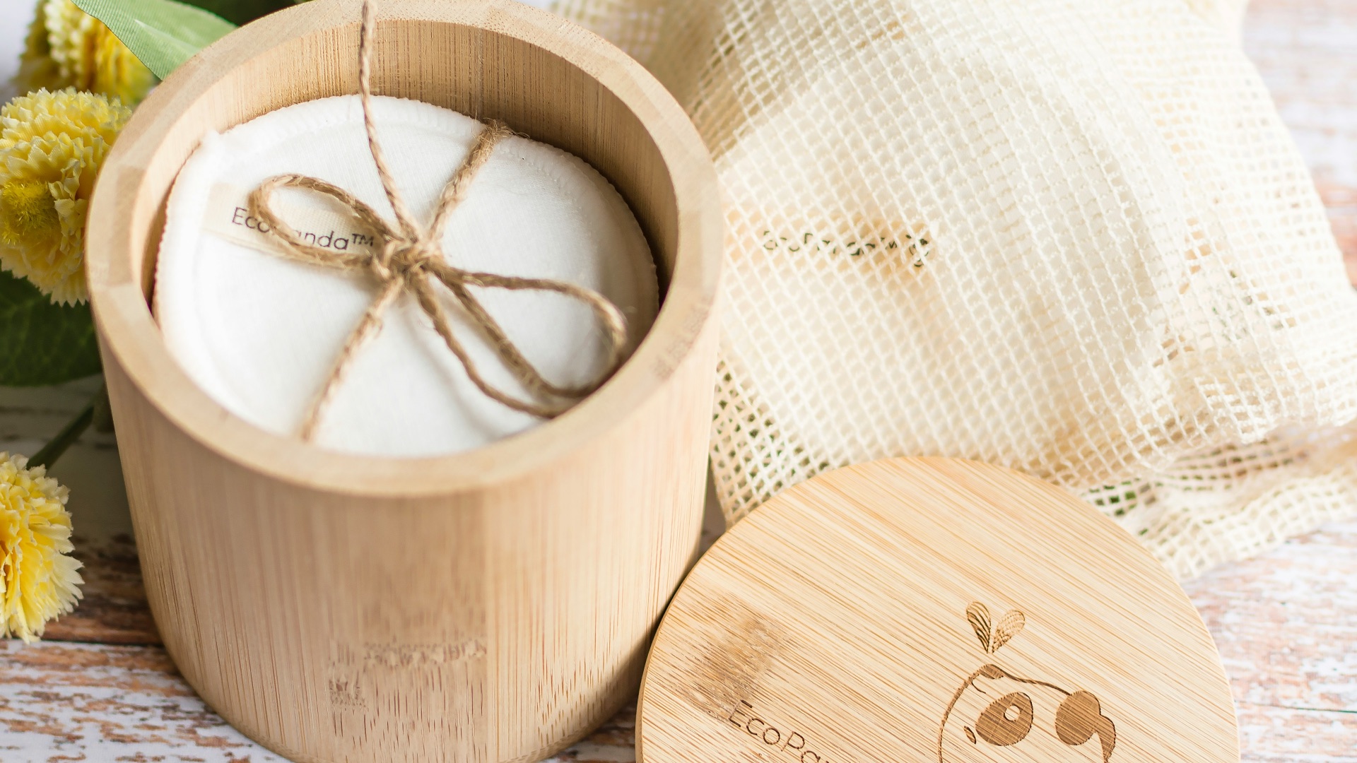 a wooden box with a candle inside of it