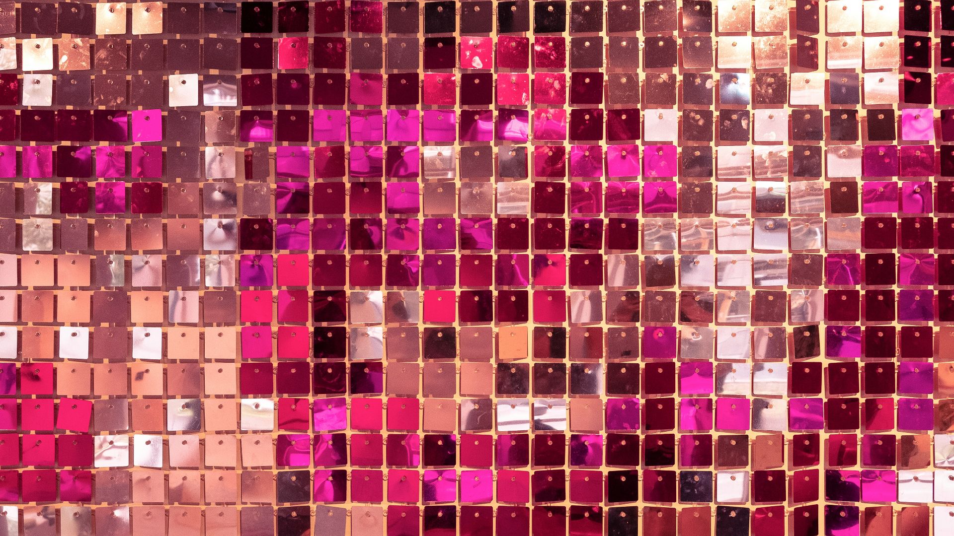 a close up of a mosaic tile wall