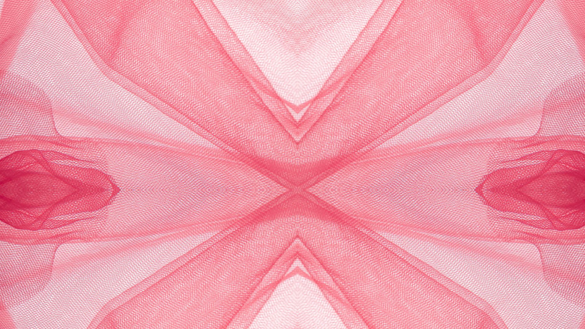 Abstract pattern of flowing pink fabric