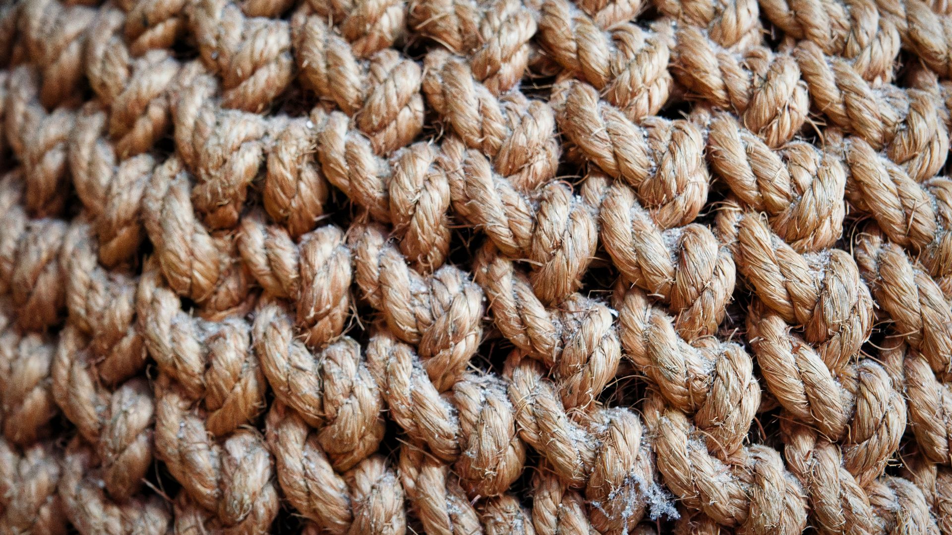 A close up of a brown crocheted object