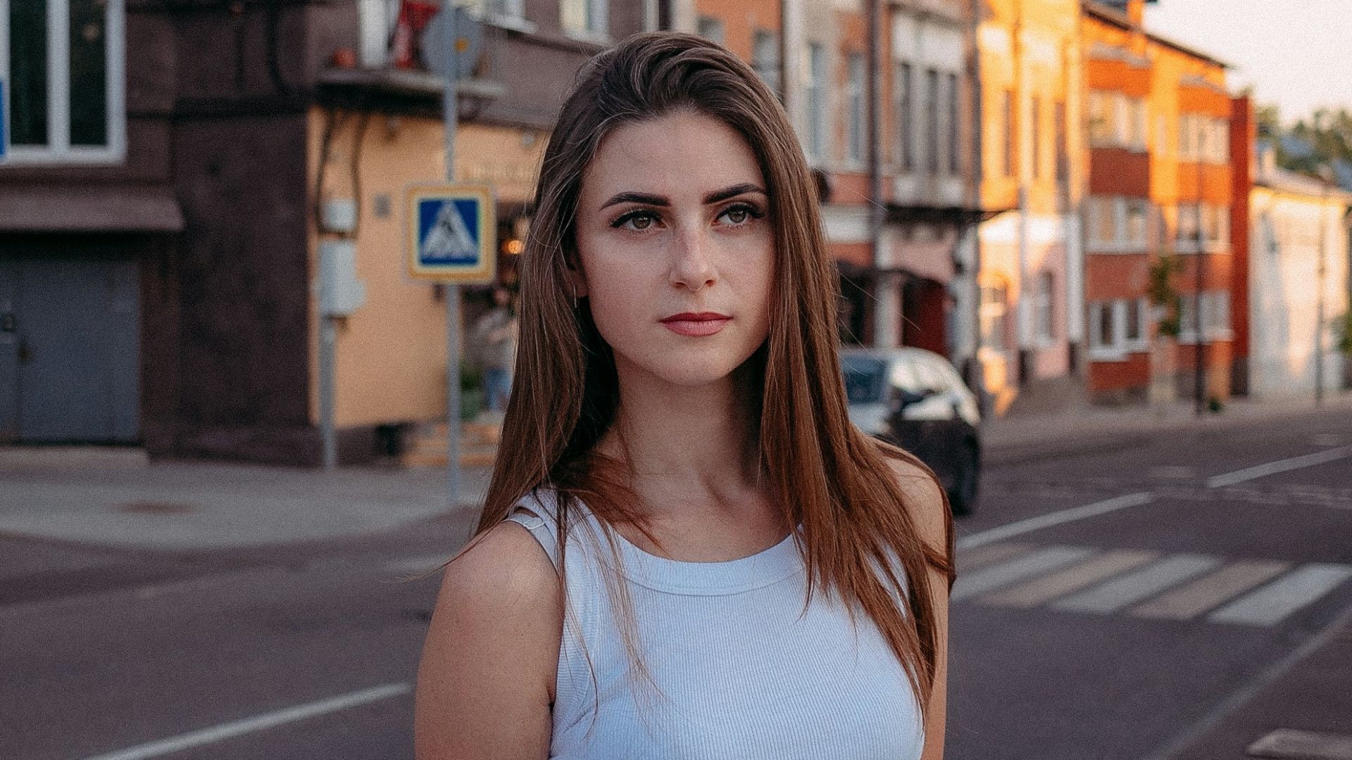a woman standing on a street