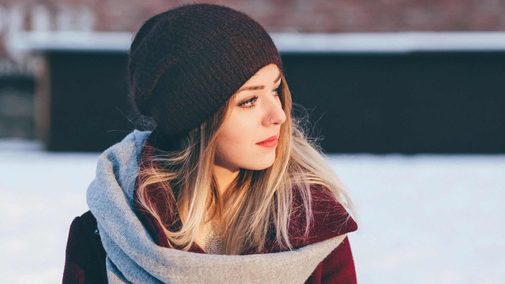 woman wearing black knitted cap