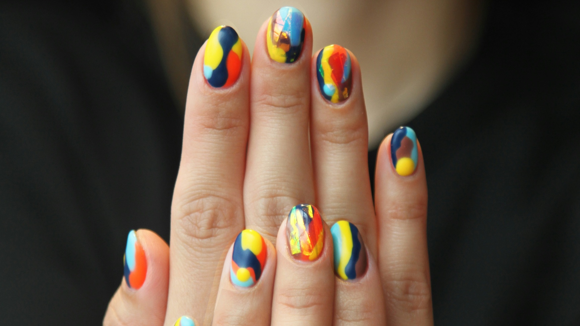woman's nails with manicure