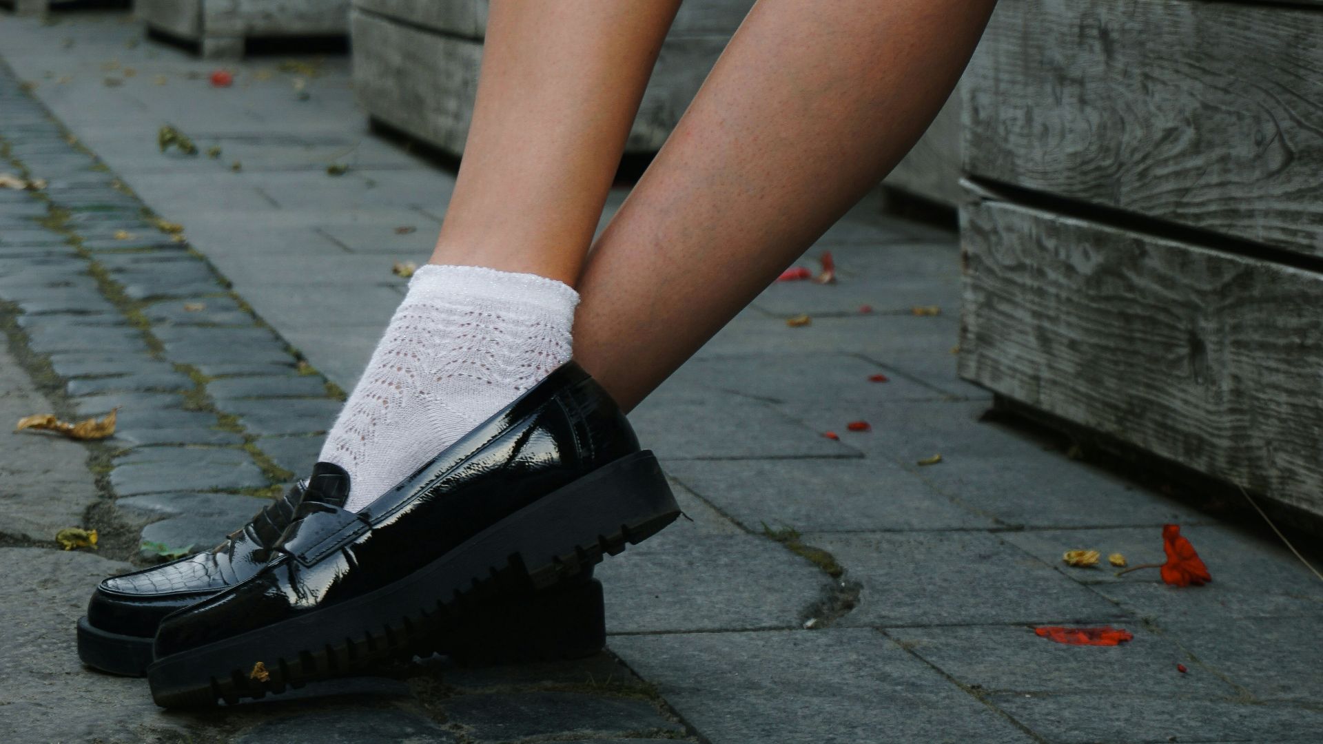 a person sitting on a bench