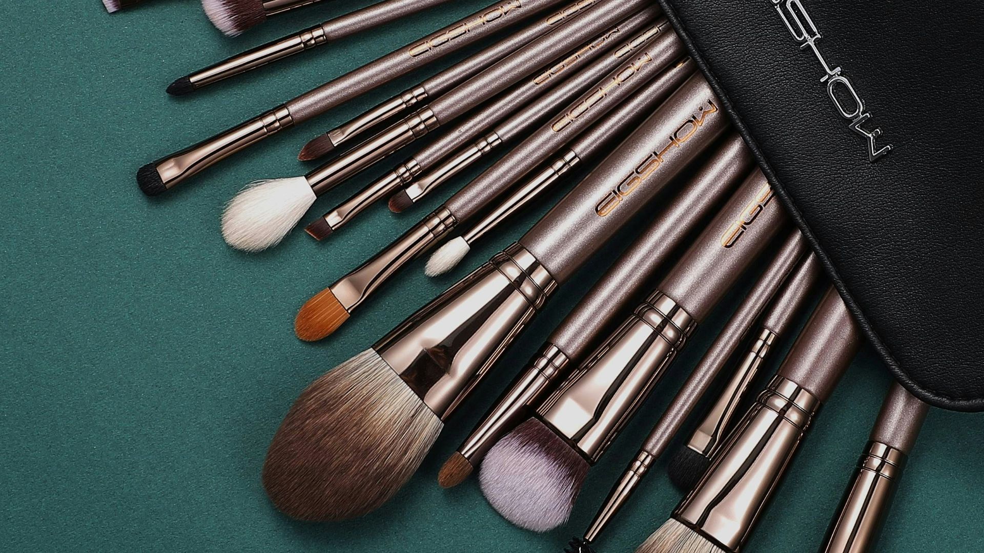 a black case filled with lots of makeup brushes