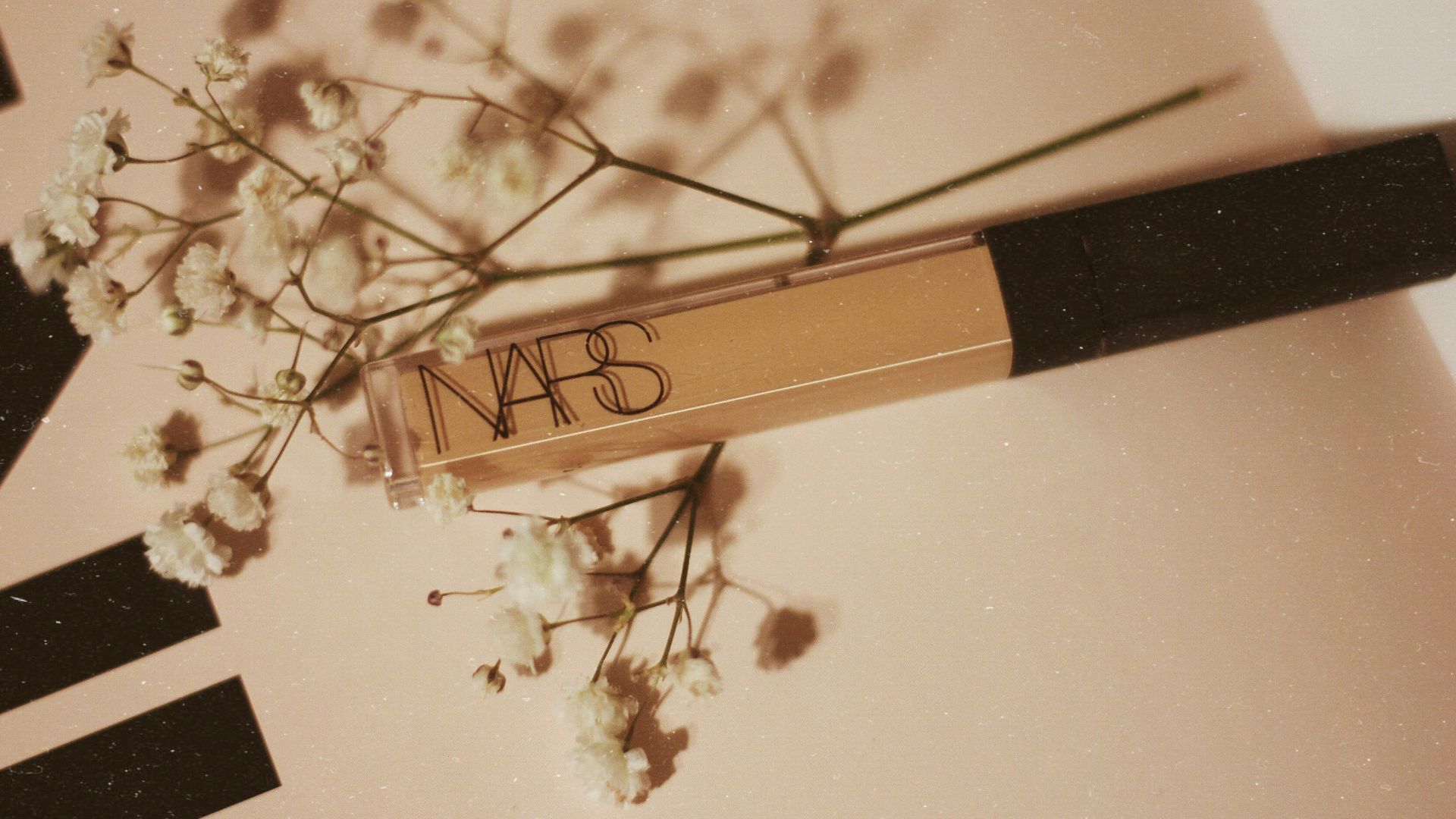 nude Nars cream bottle