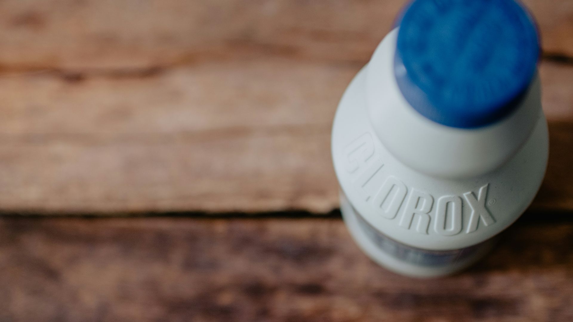 white and blue plastic bottle