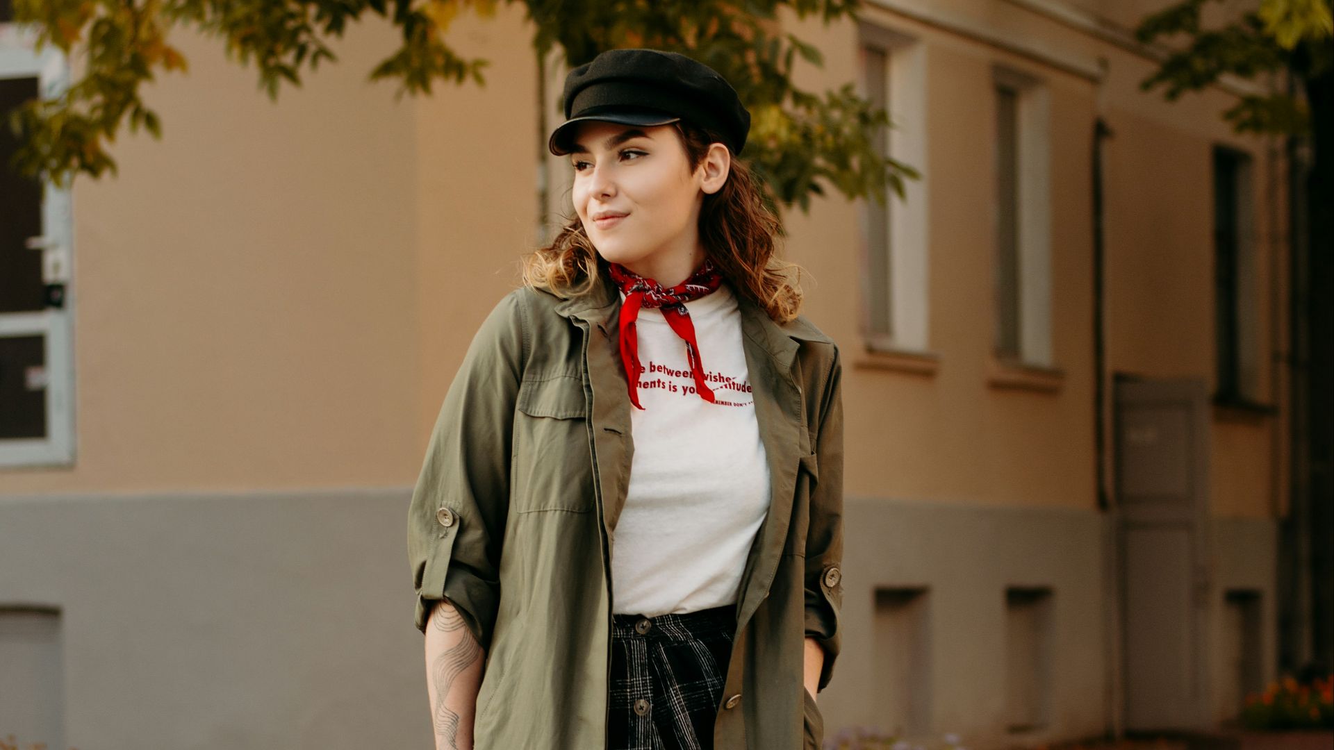 woman standing on pavement