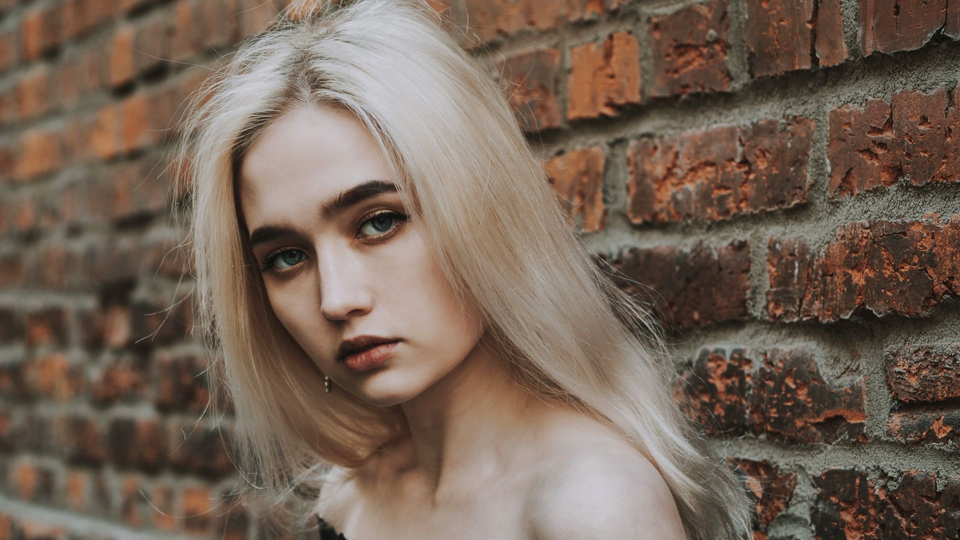 woman in black off shoulder dress