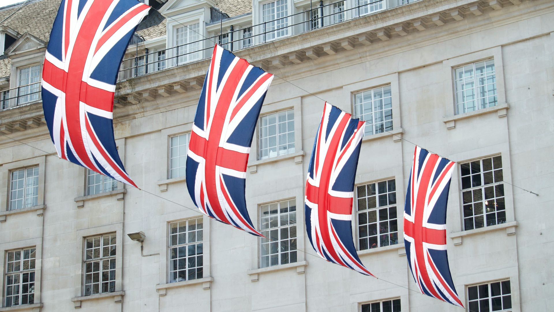 United Kingdom flags hanged near building