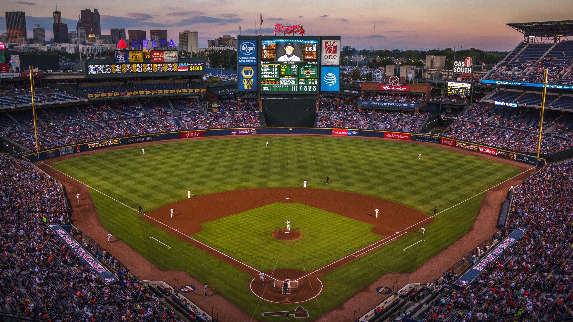 players and fans on baseball stadium