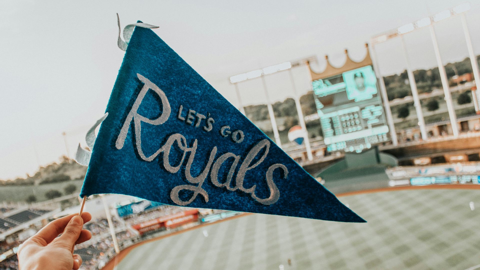 blue and white Lets Go Royal pennant