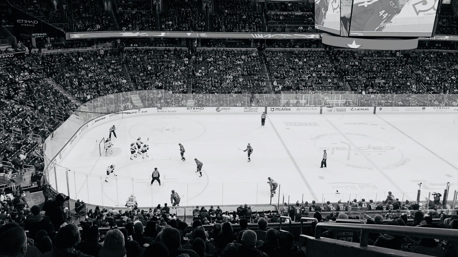 ice hockey players on ice hockey arena