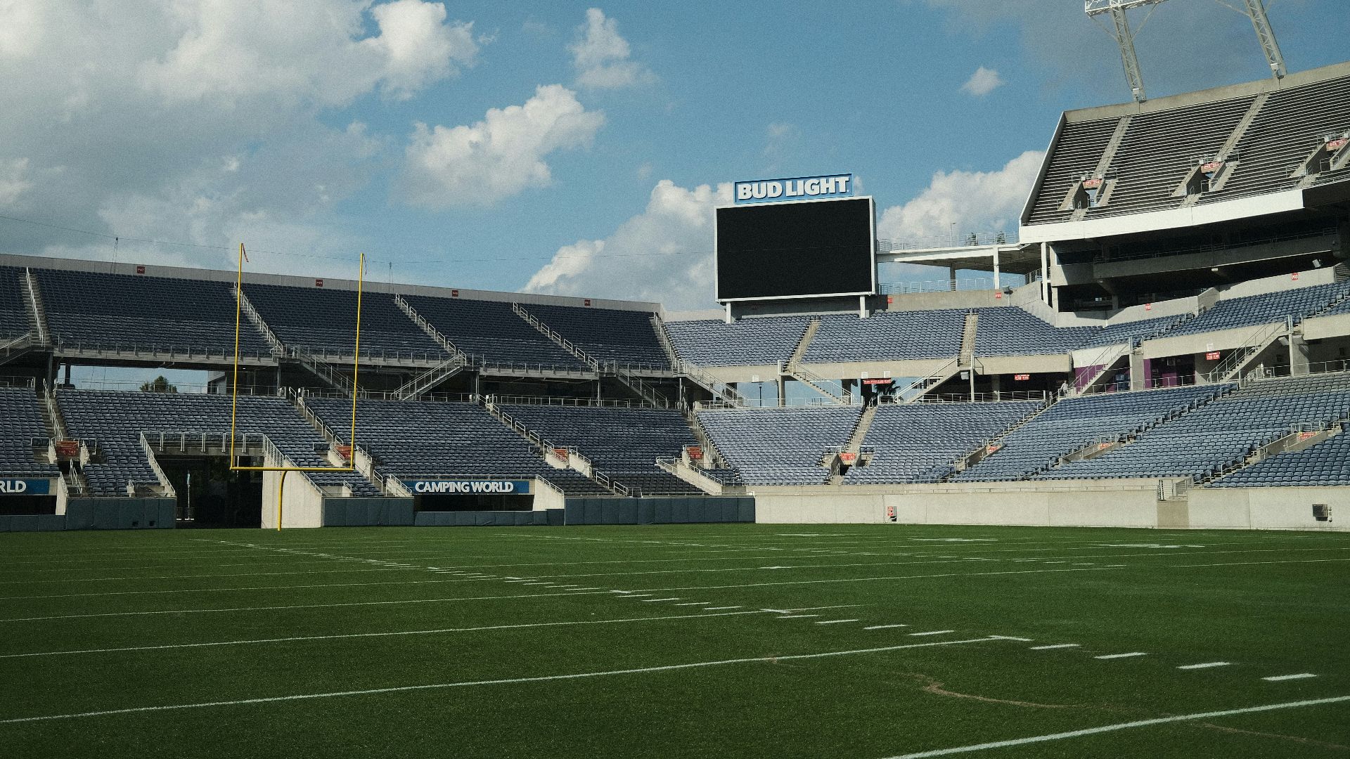 a view of a football stadium from the field