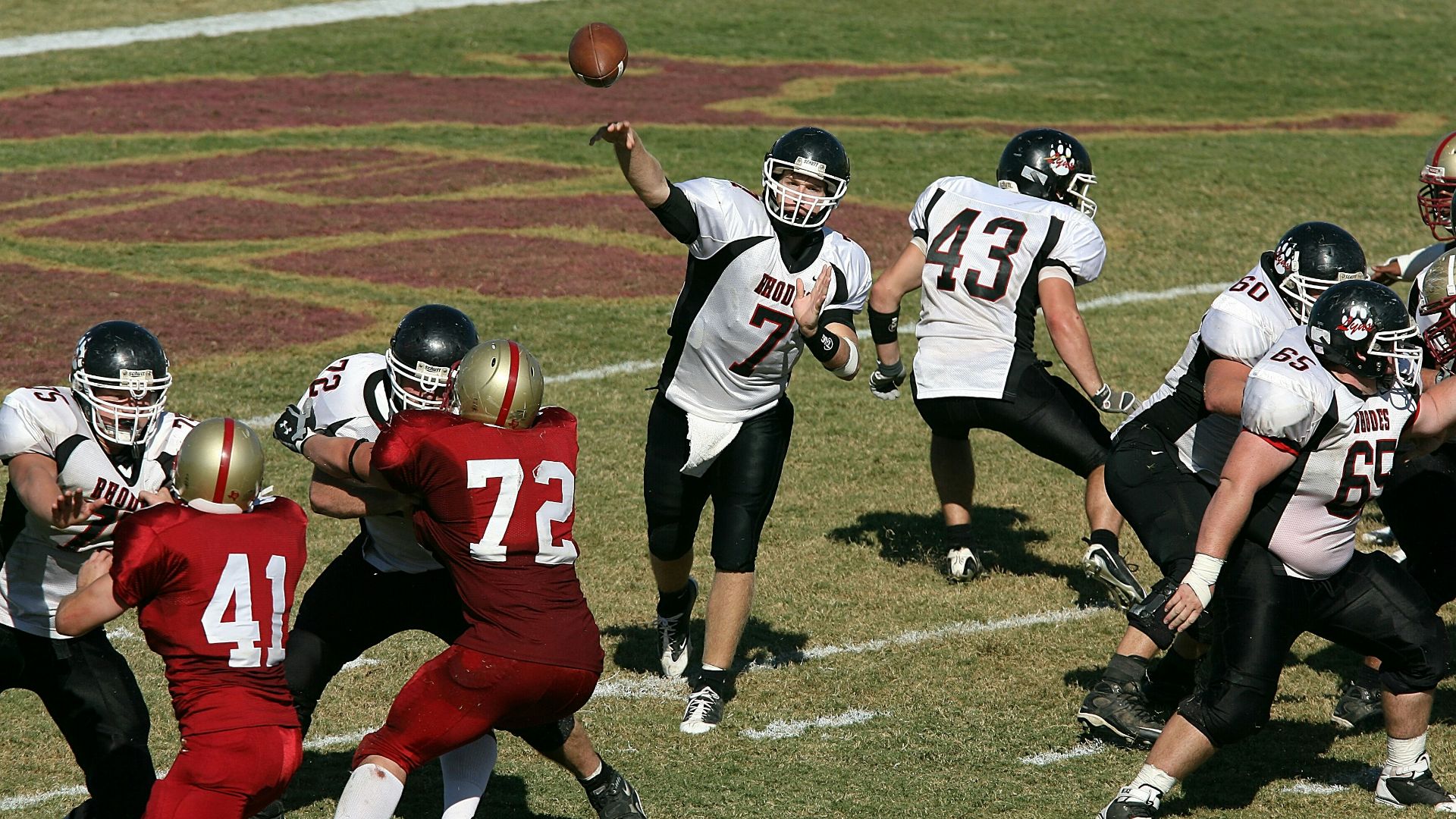 group of men playing football