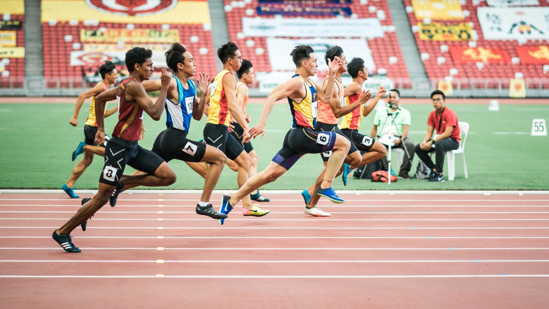 group of man running on the field