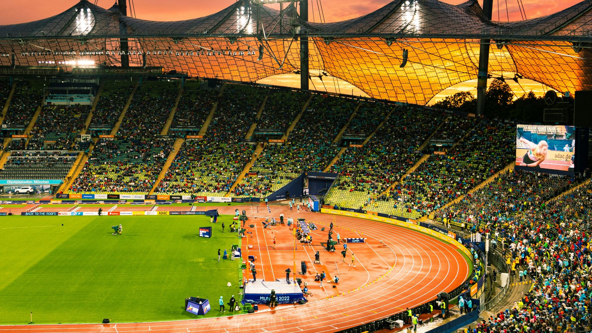 a baseball stadium with a crowd of people in it