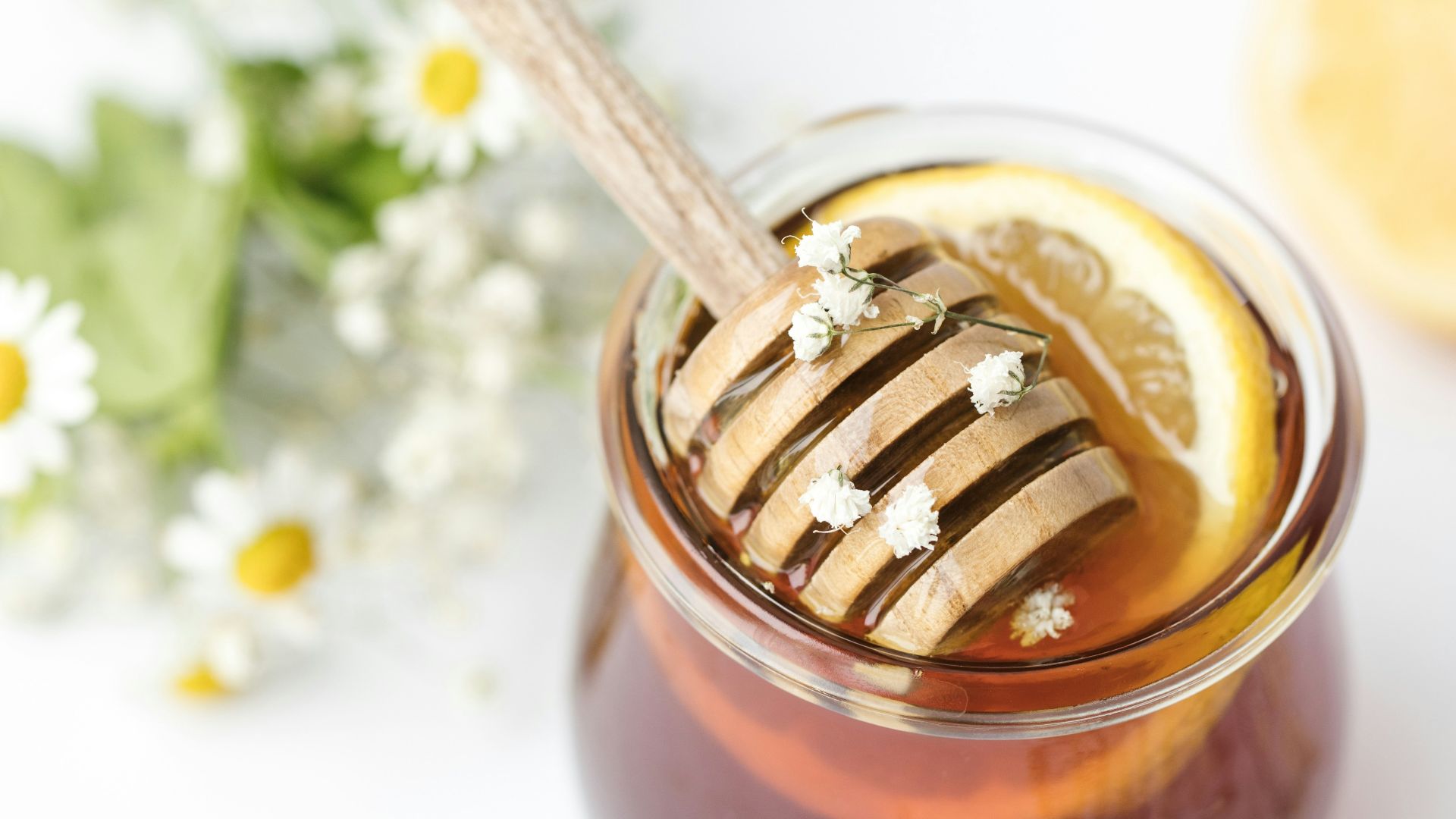 honey in glass on tabel