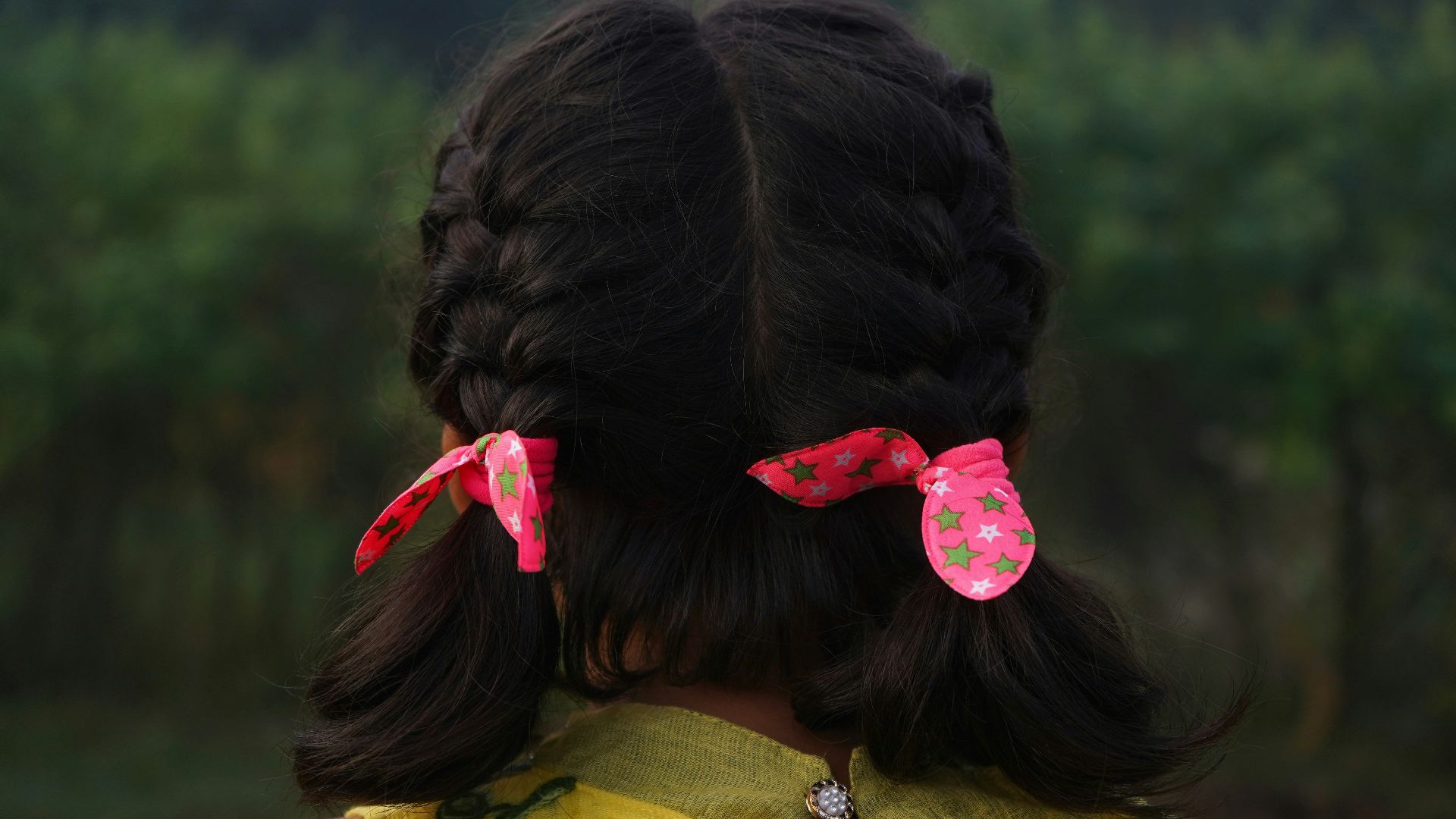 a person with a flower in the hair