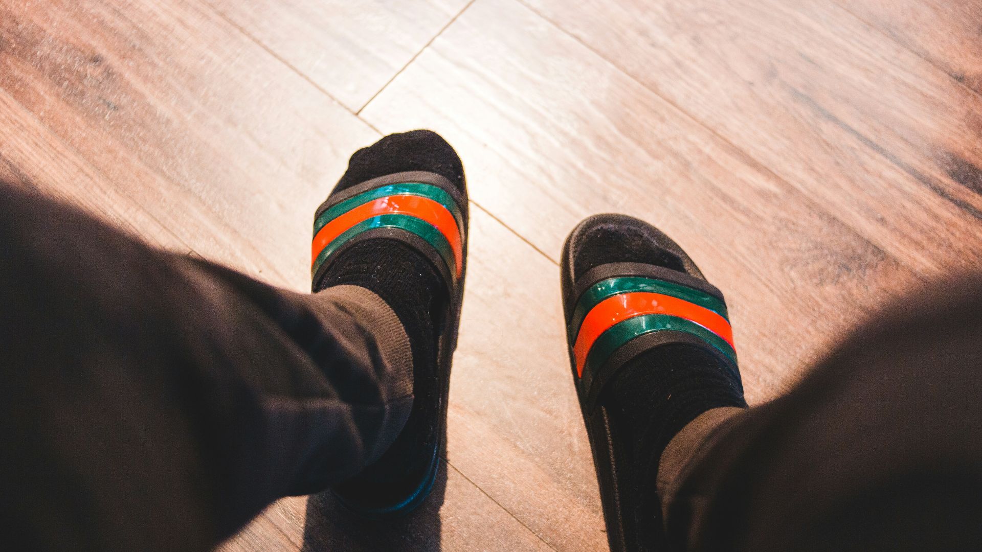 black-and-gray slide sandals