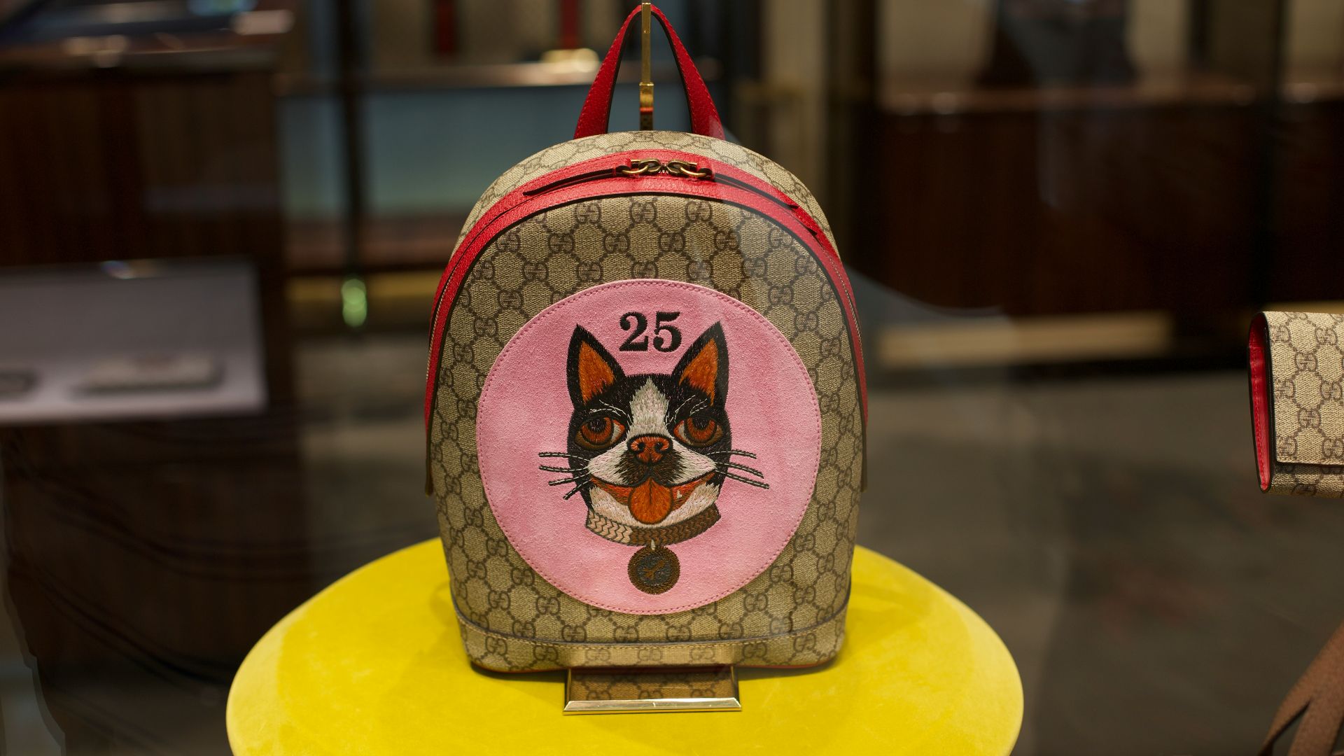 a purse with a picture of a cat on it