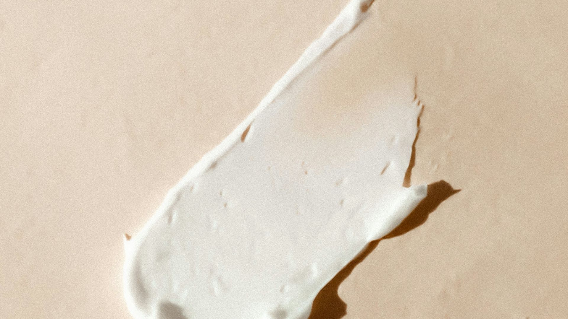 white cotton buds on white surface