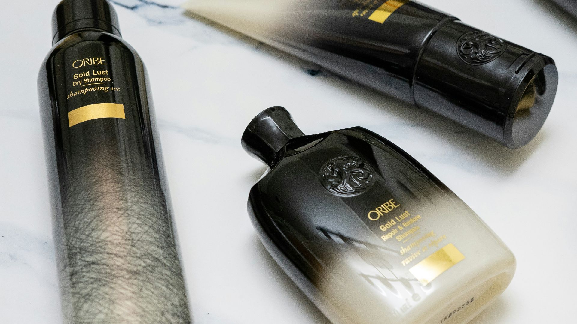 black and gold perfume bottle